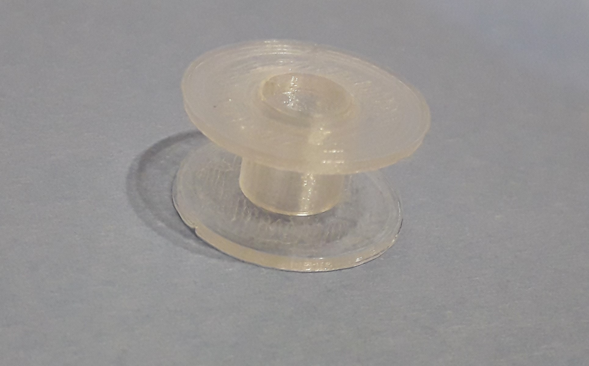 Bobbin for sewing machines.