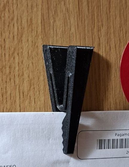 Self-adhesive clothespin