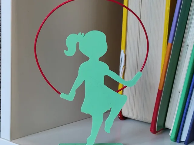 Little girl jumping over Filament rope