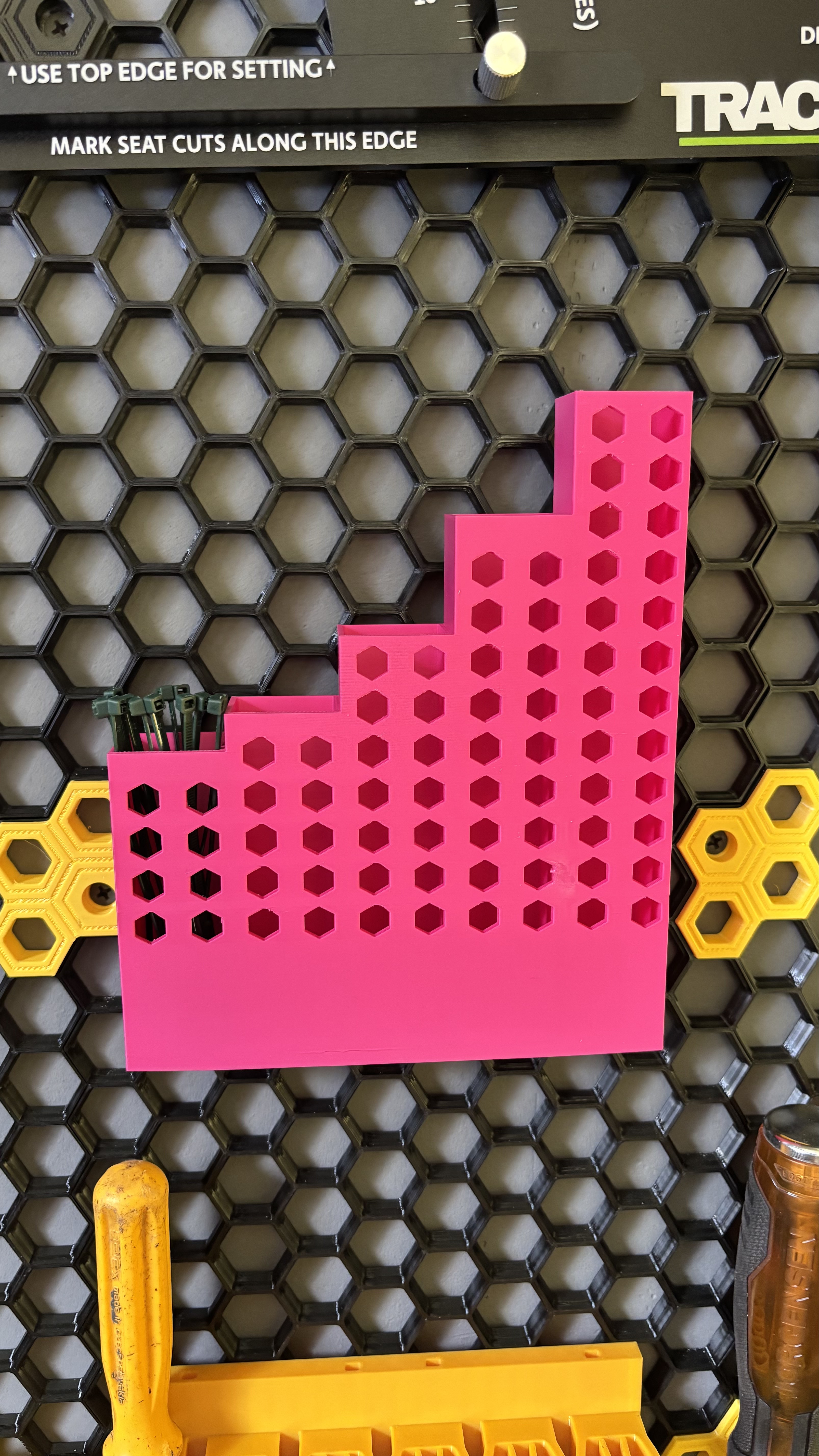 ZIP tie holder for honeycomb wall