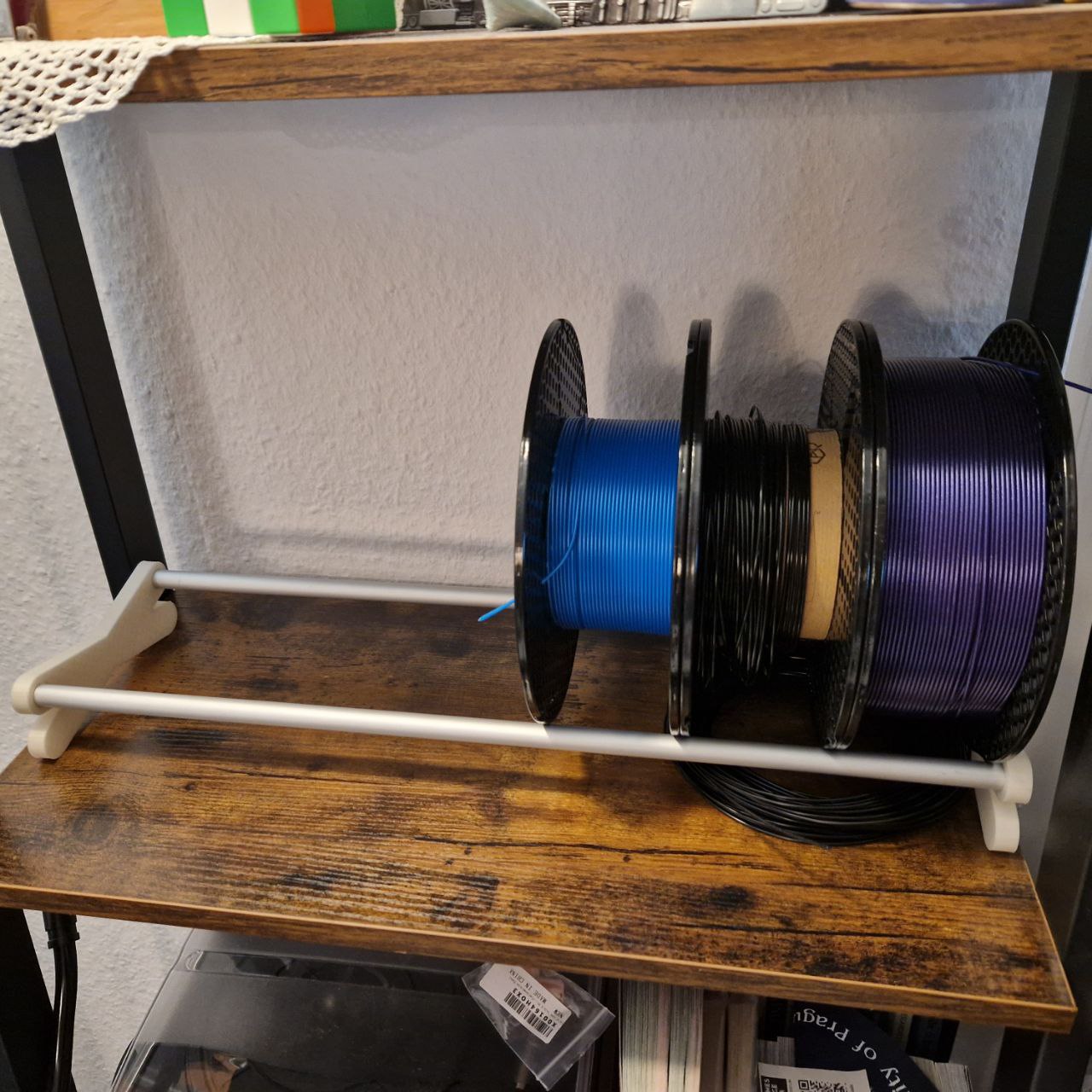 A simple spool holder with openscad-12 mm bars