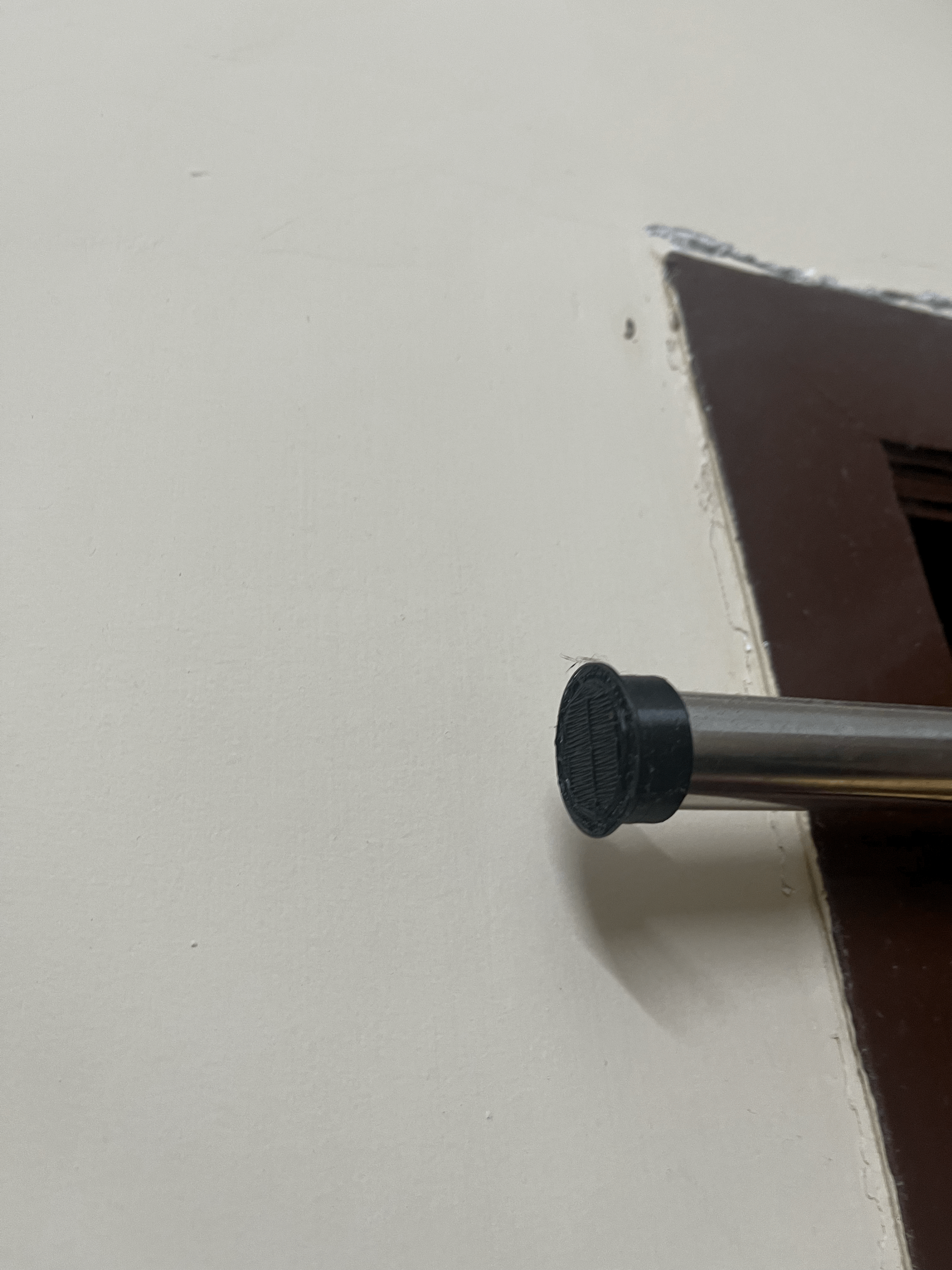 Curtain rod end cap