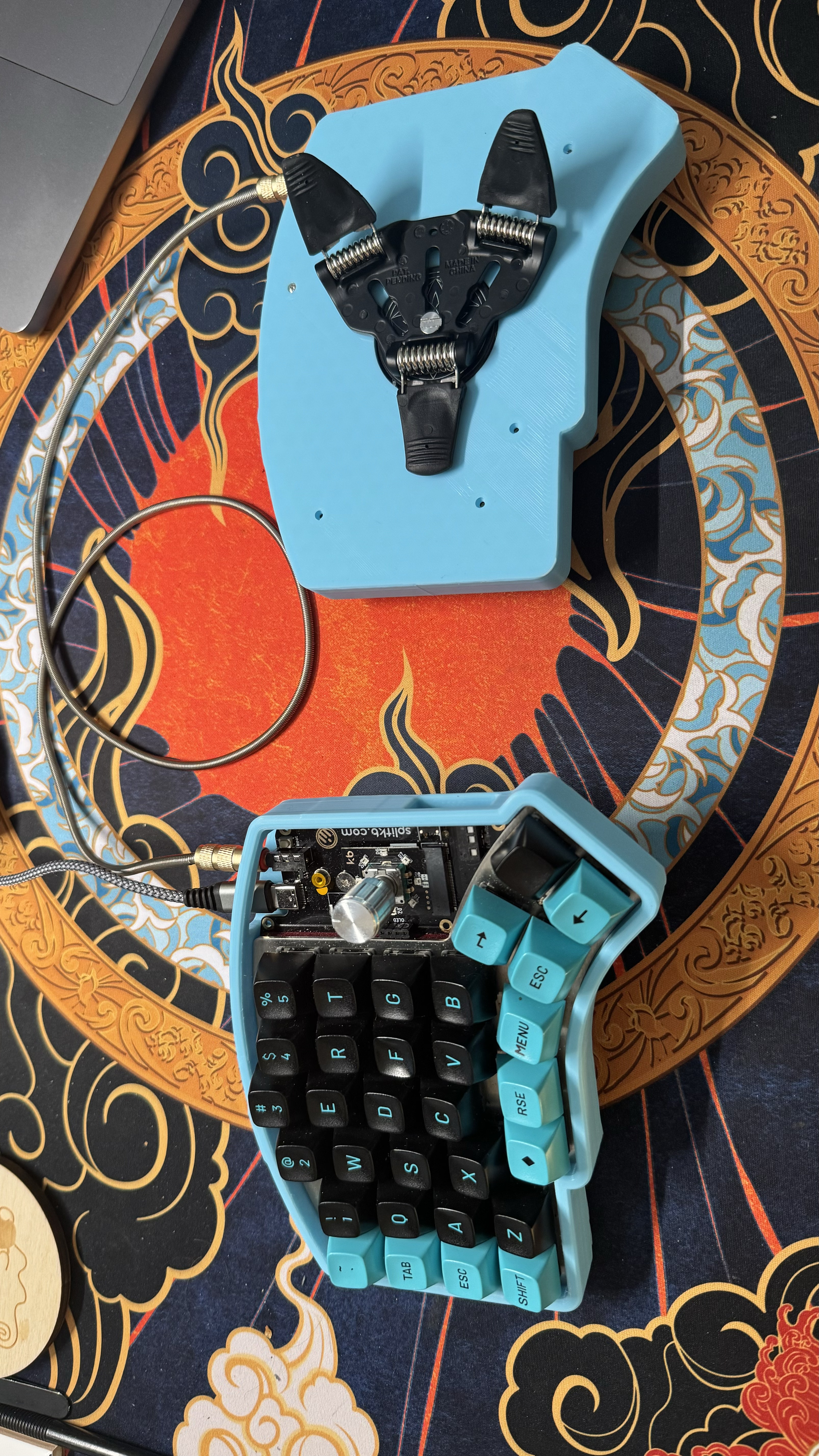 Elora keyboard case with puck holes