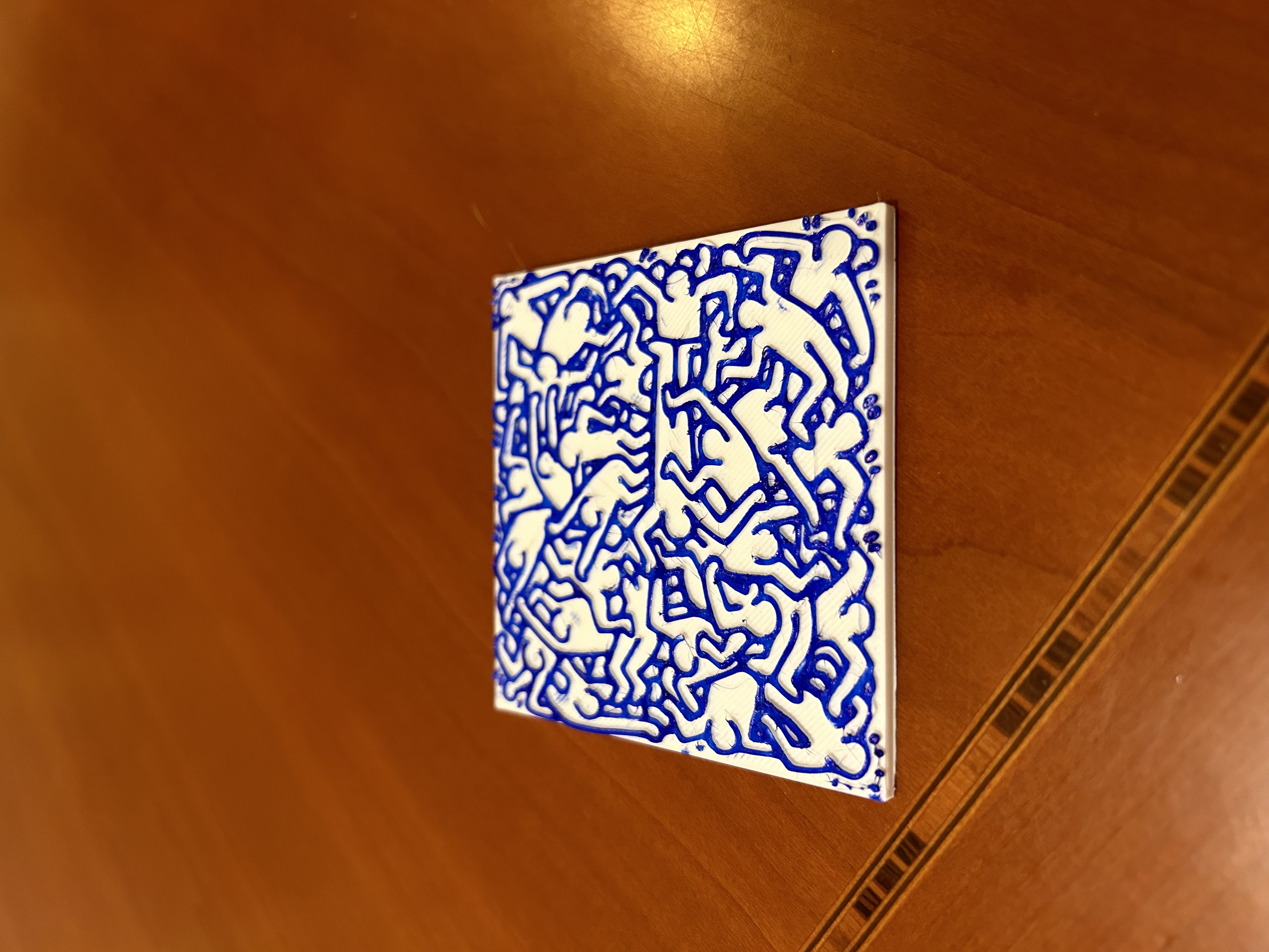 Coaster image by keith Haring