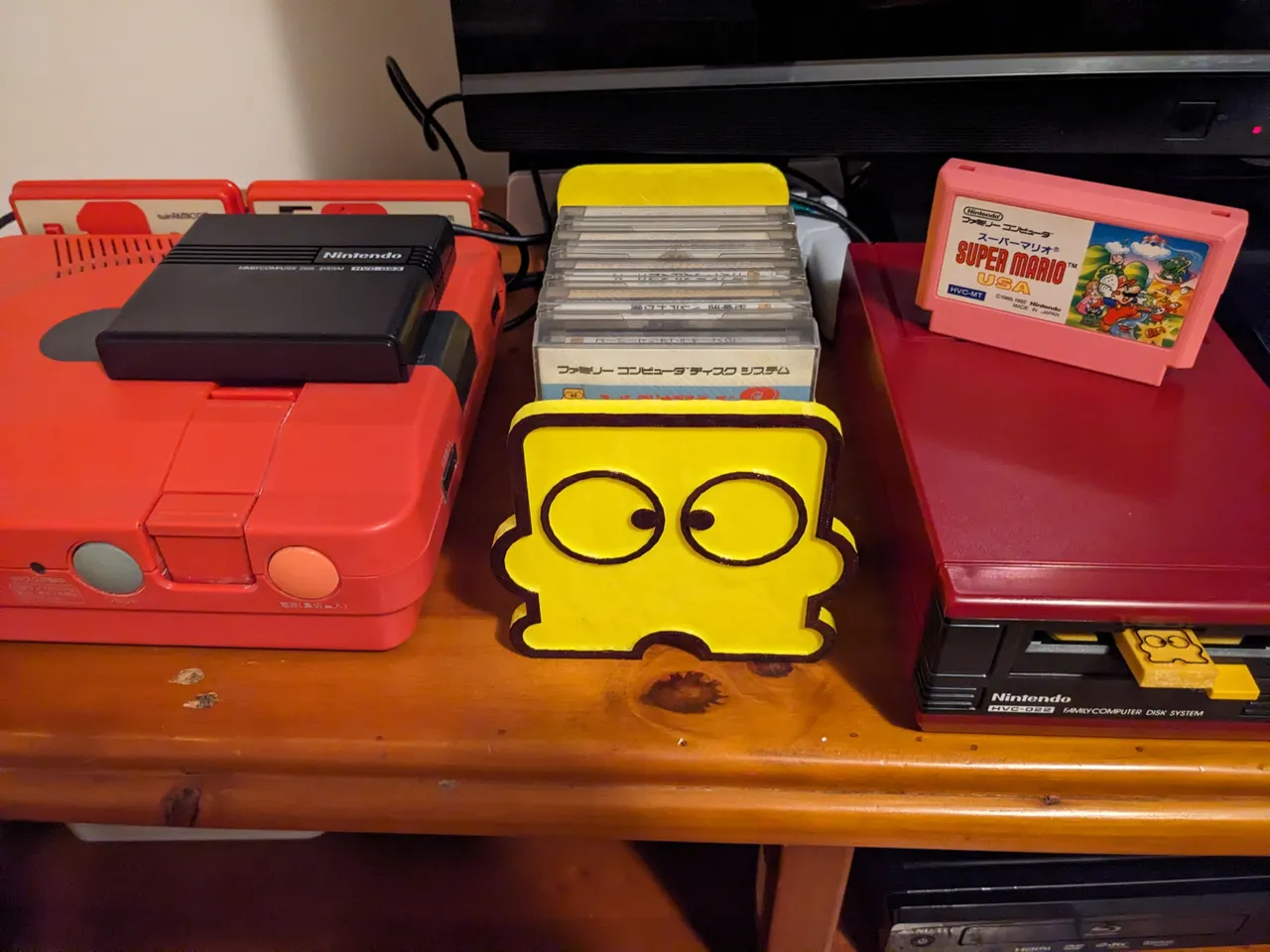 Nintendo Famicom Disk System Game Rack by Retro Realistic Hobbies