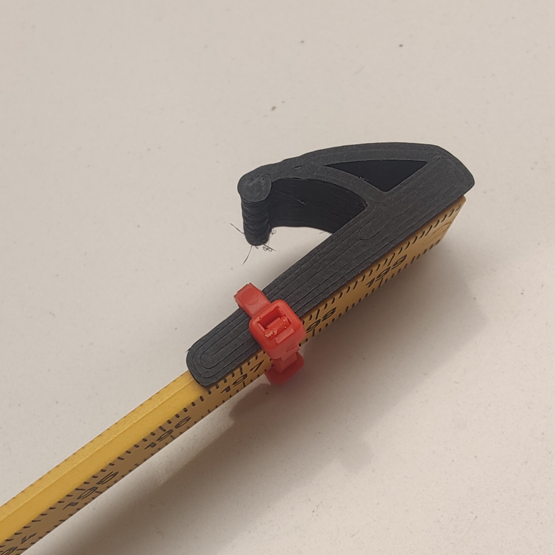 Folding ruler hook for electricians