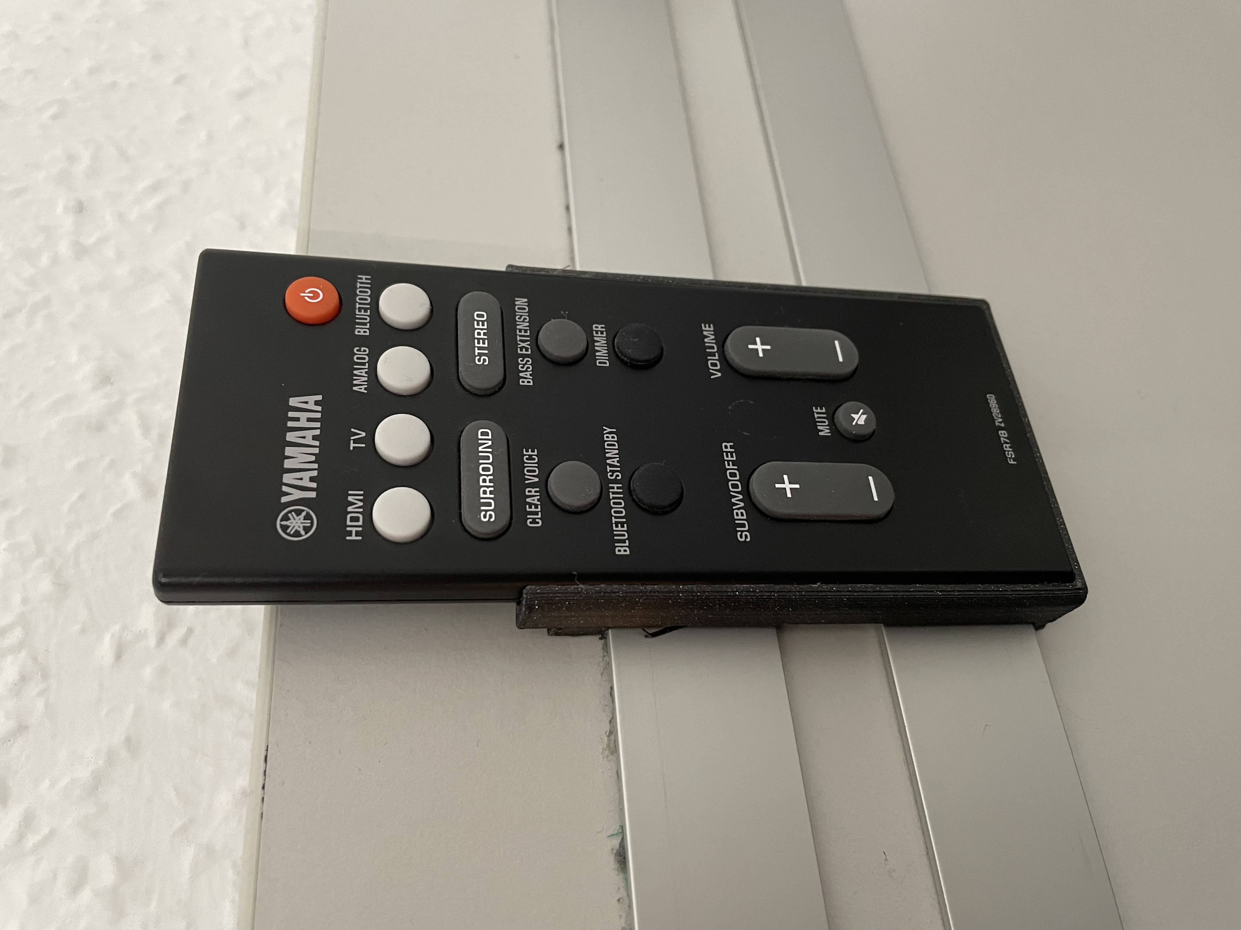 Yamaha soundbar remote control mounting fixture