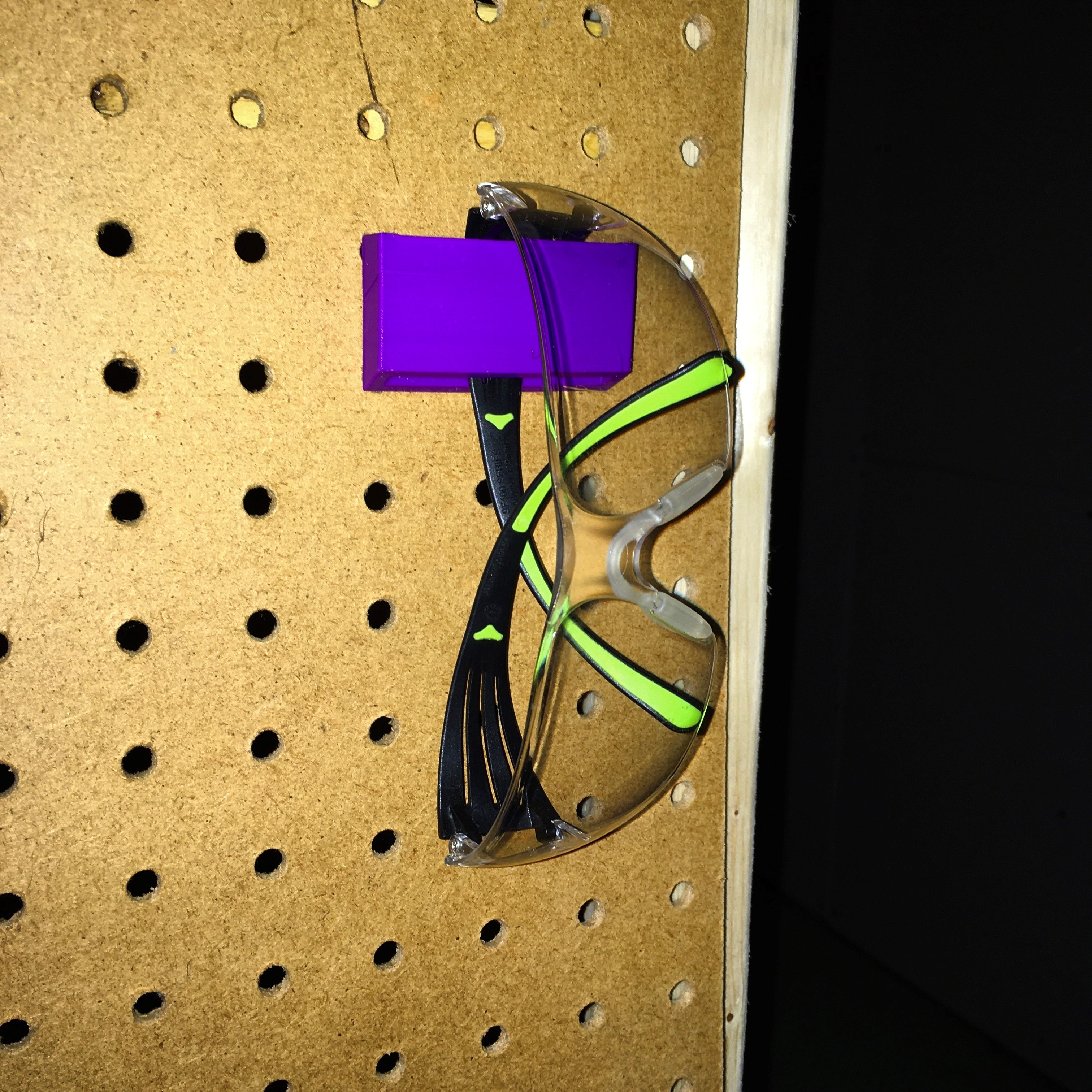 Quick safety glasses holder; pegboard
