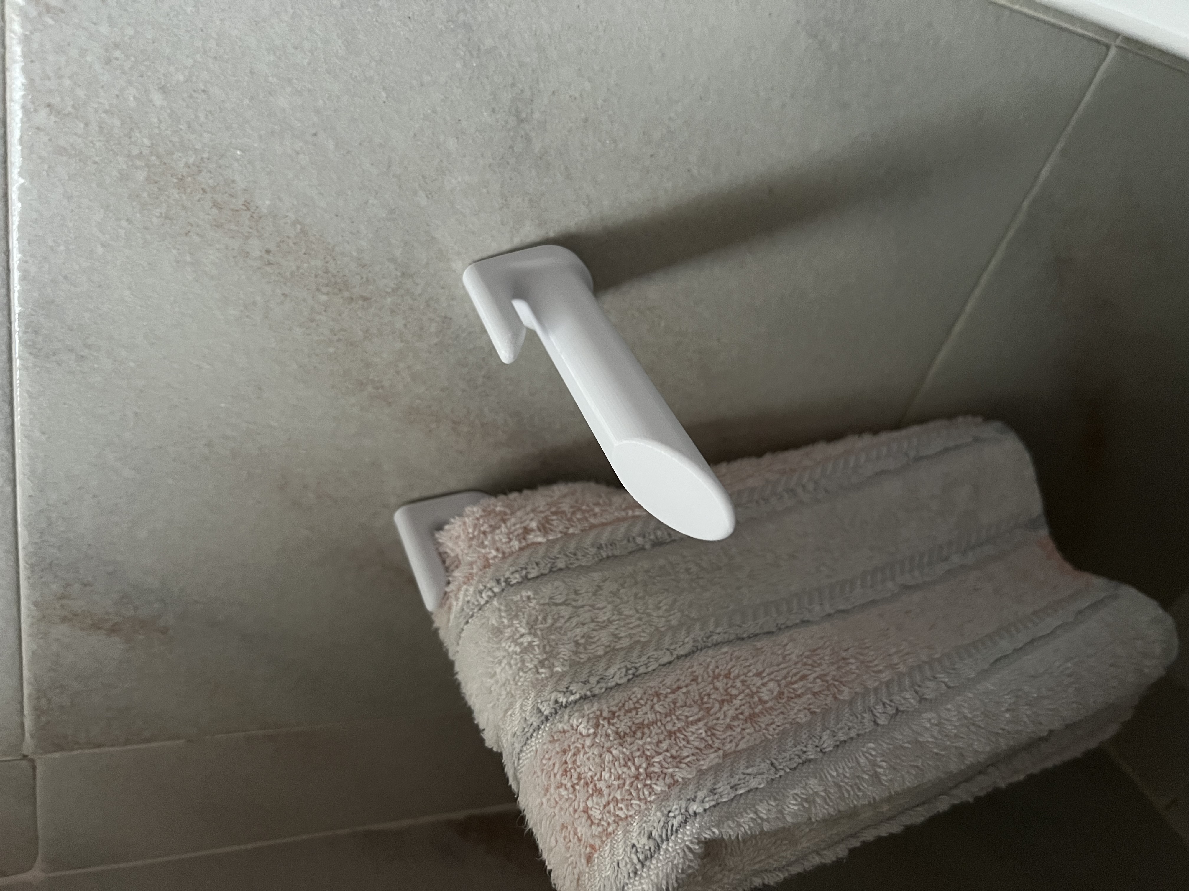 Toilet towel holder