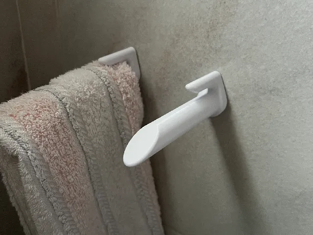 Toilet towel holder
