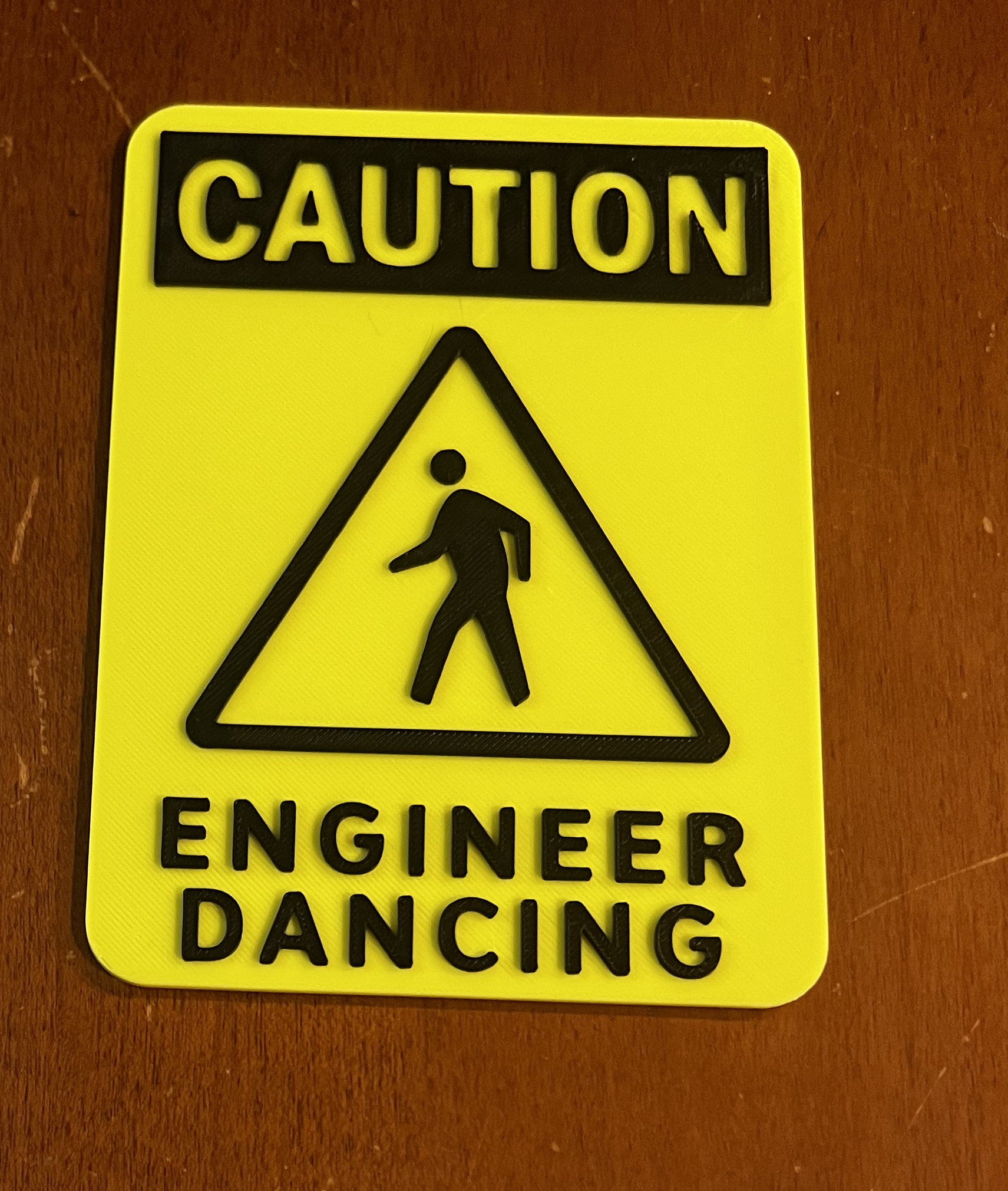 Caution: Engineer Dancing Sign