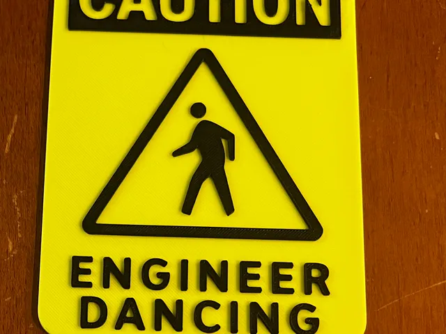 Caution: Engineer Dancing Sign