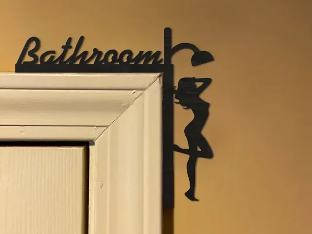 bathroom door/wall art