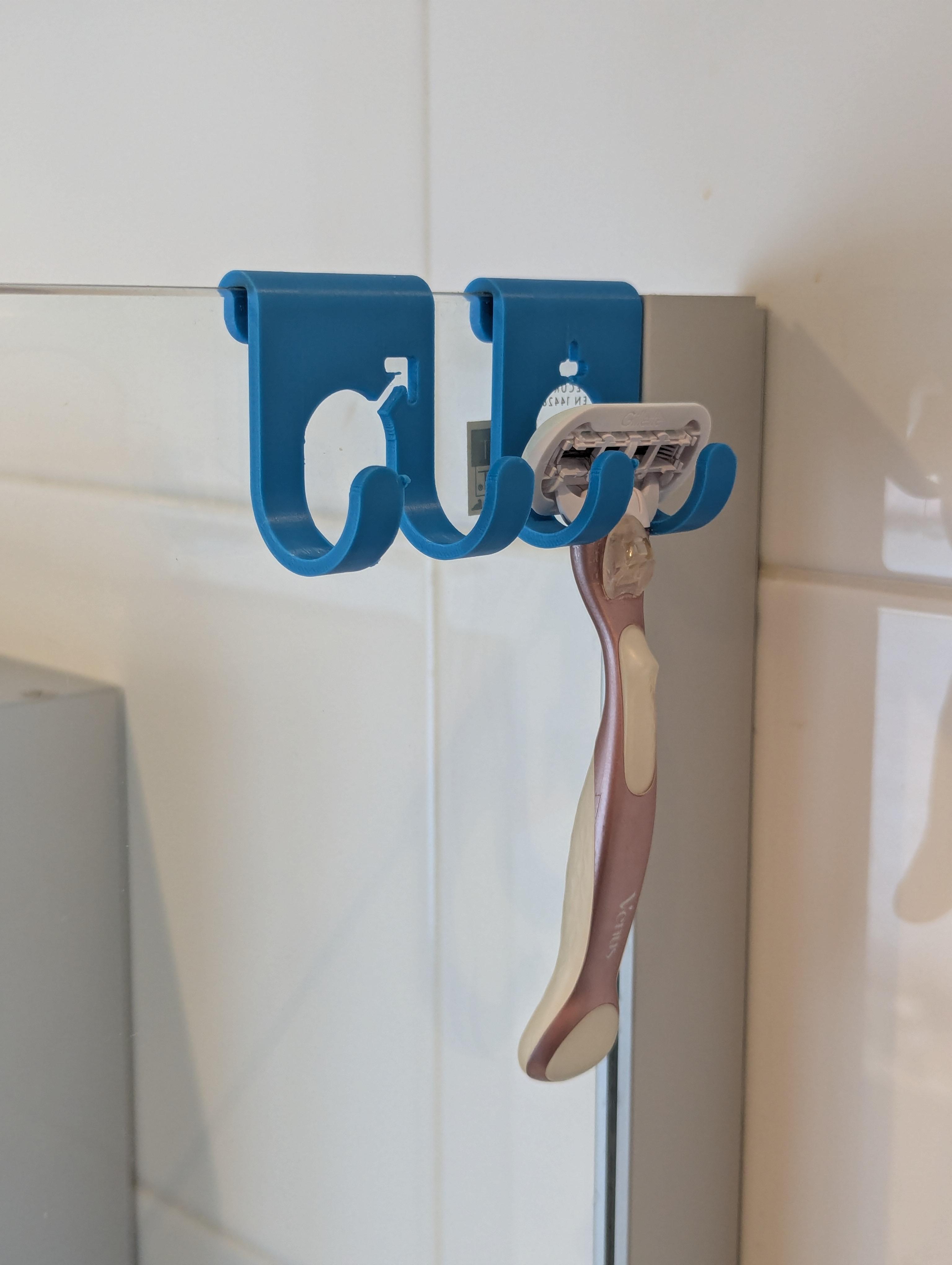Razor hanger in shower