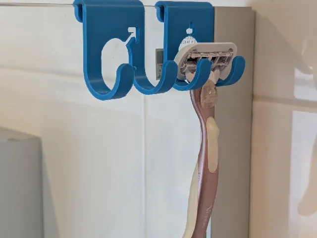 Razor hanger in shower
