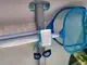 tubular pool holder for pool items like goggles and pool cleaners