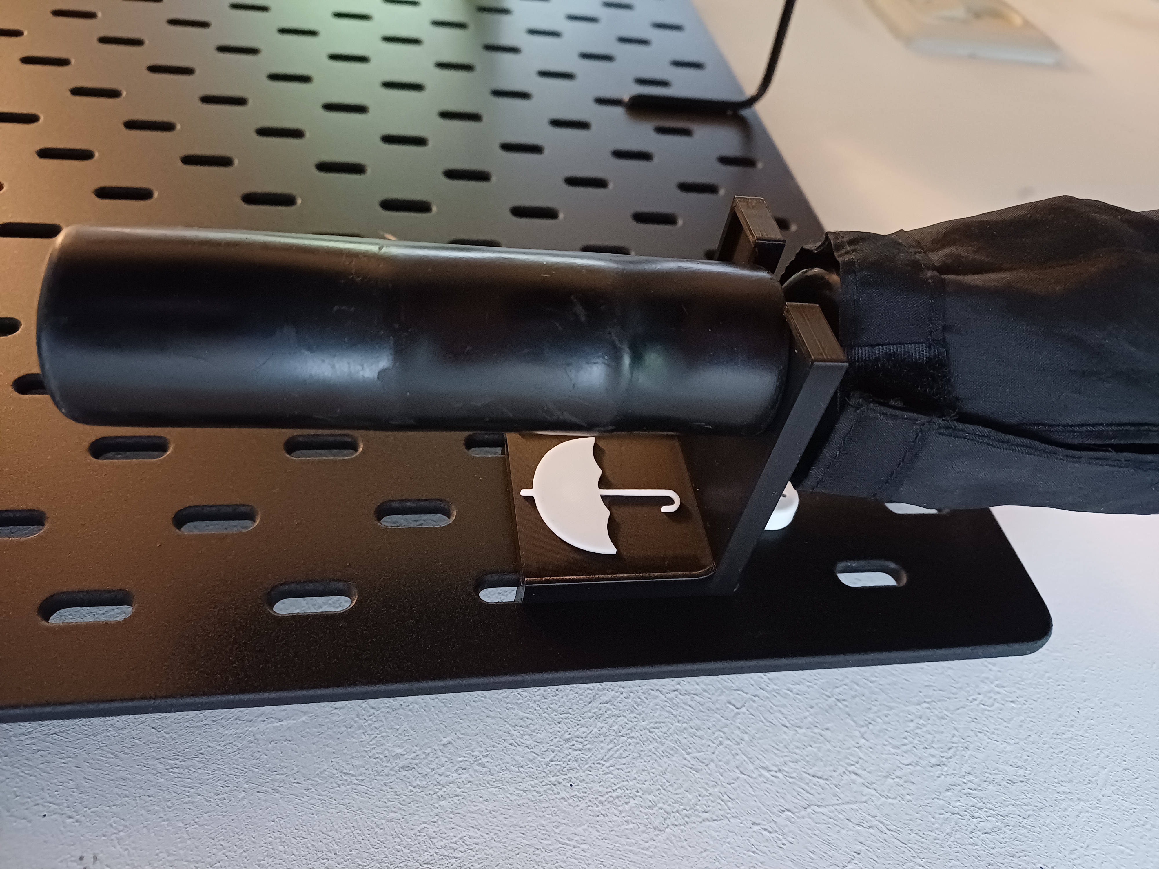 Skadis Umbrella holder