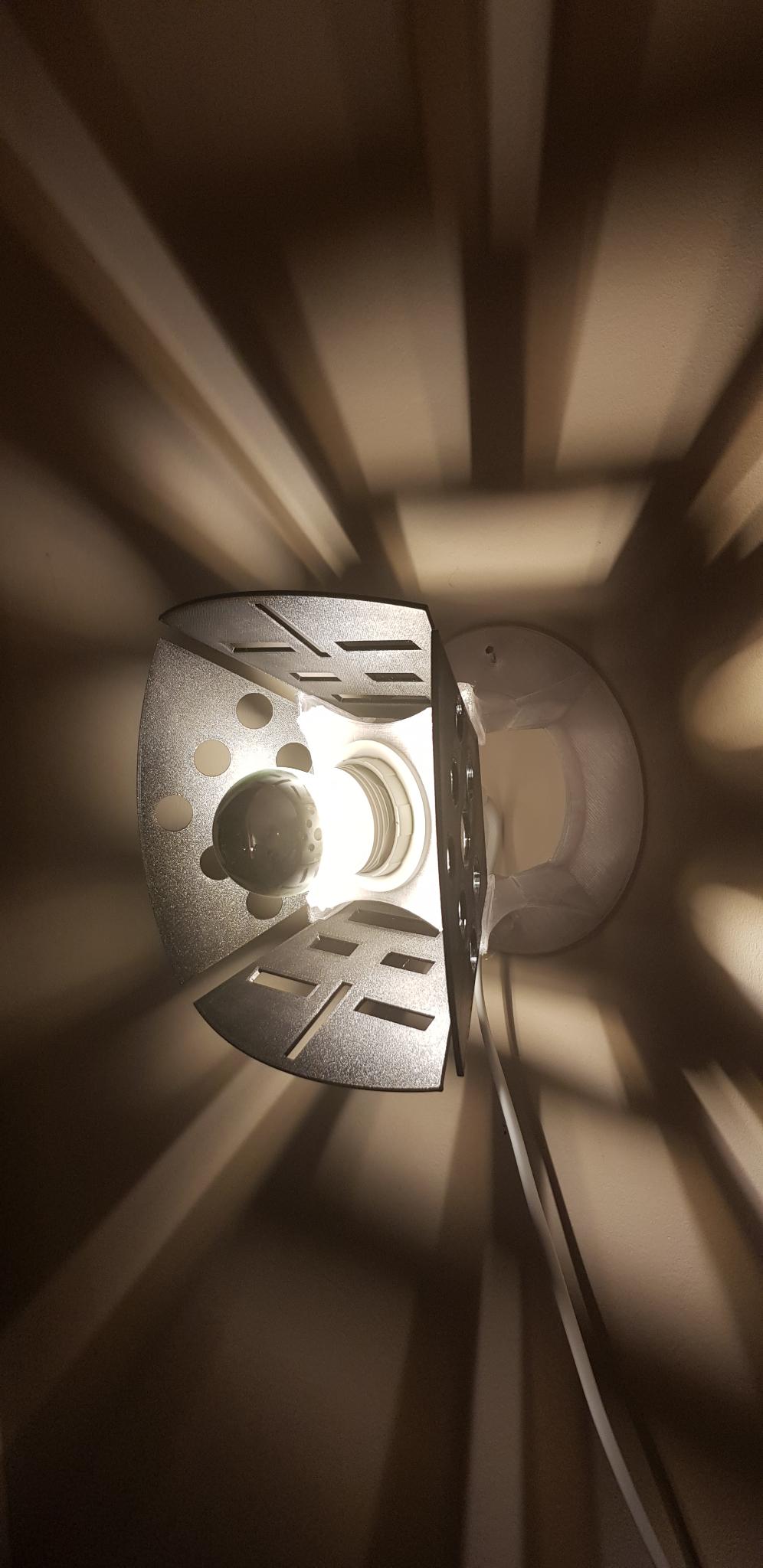 Wall lamp with interchangeable geometric projections snapon assembly