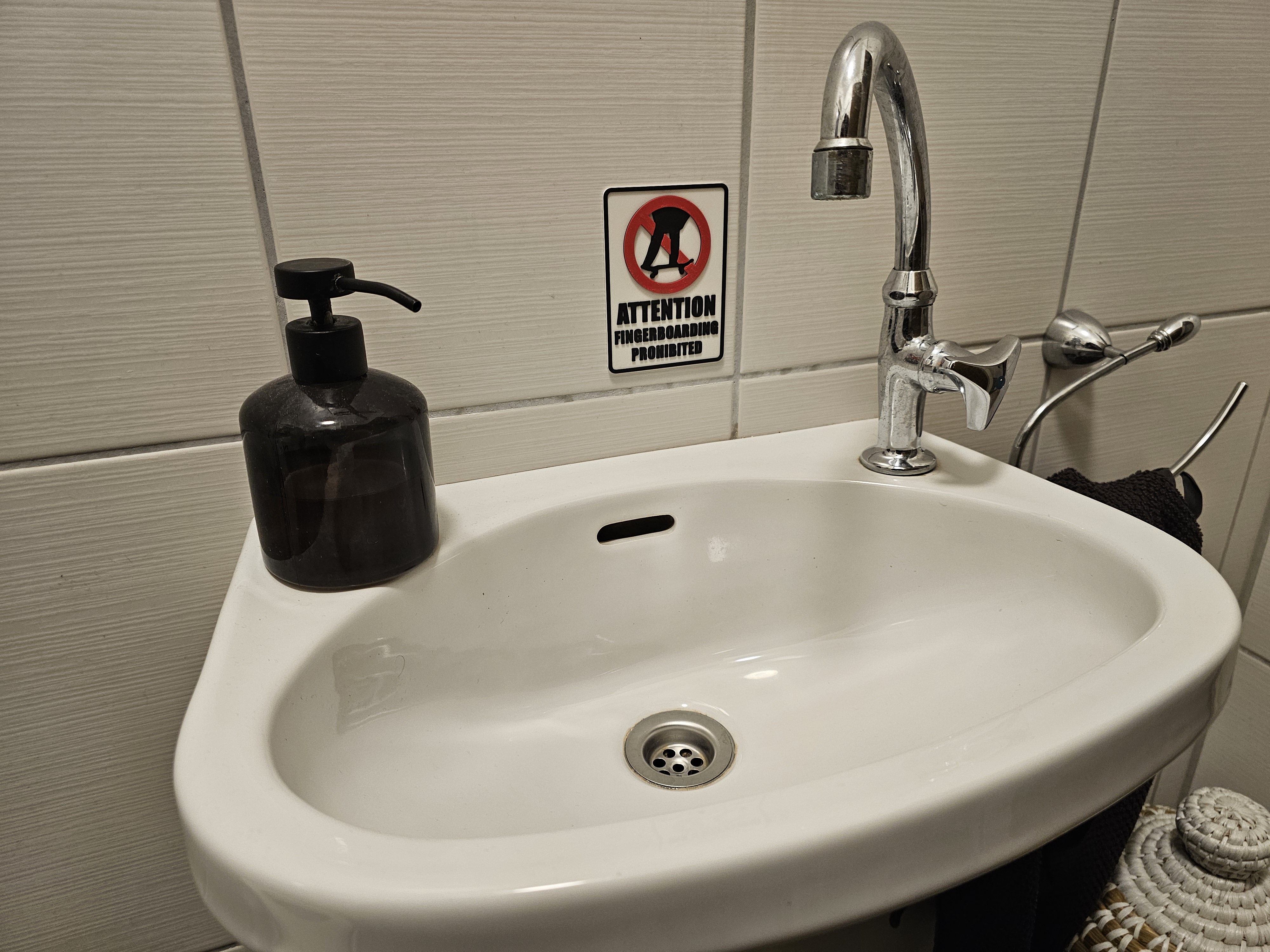 No Fingerboarding Sign