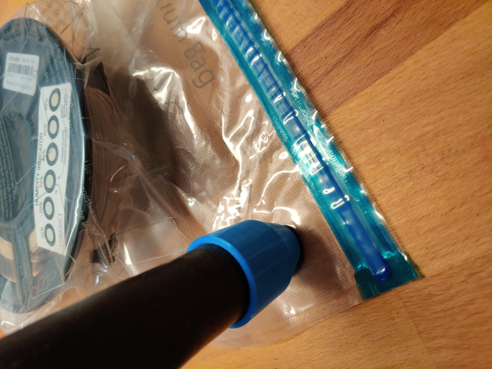 Hose adapter for filament vacuum bag
