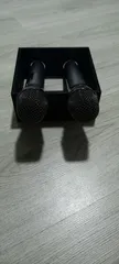 Doble microphone holder