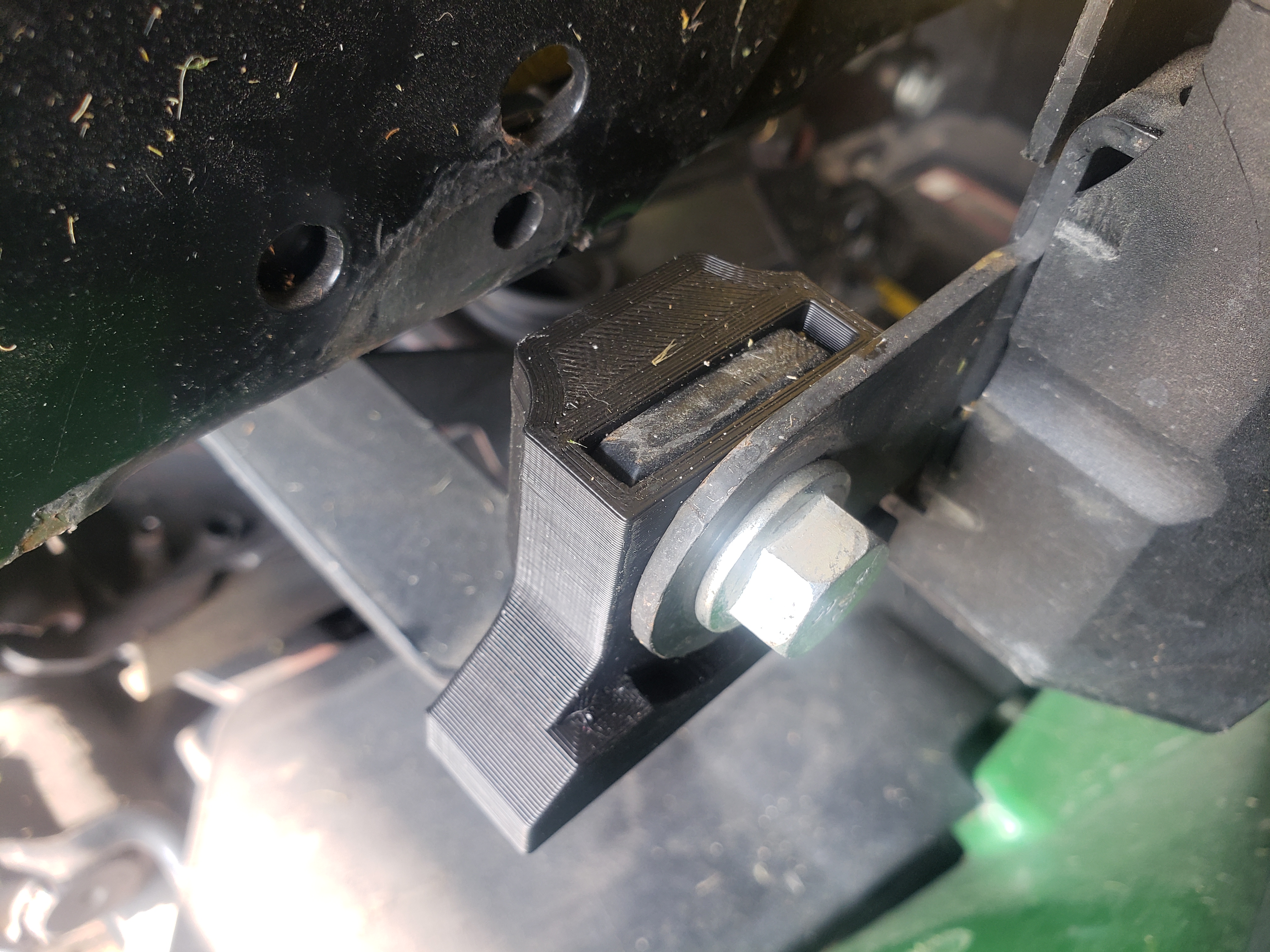 John Deere 1 series tractor seat belt stop