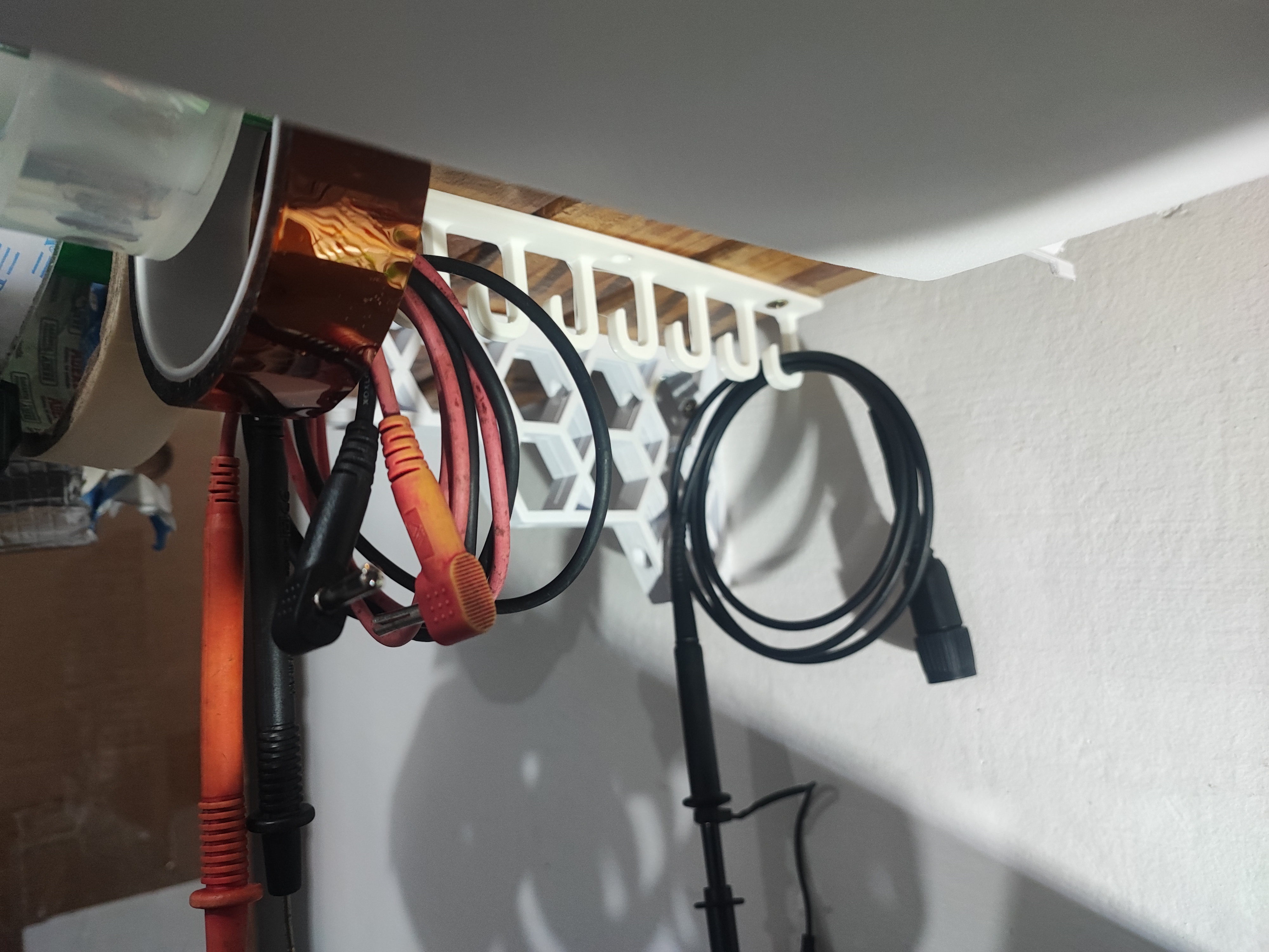 Under shelf cable hanger / hook