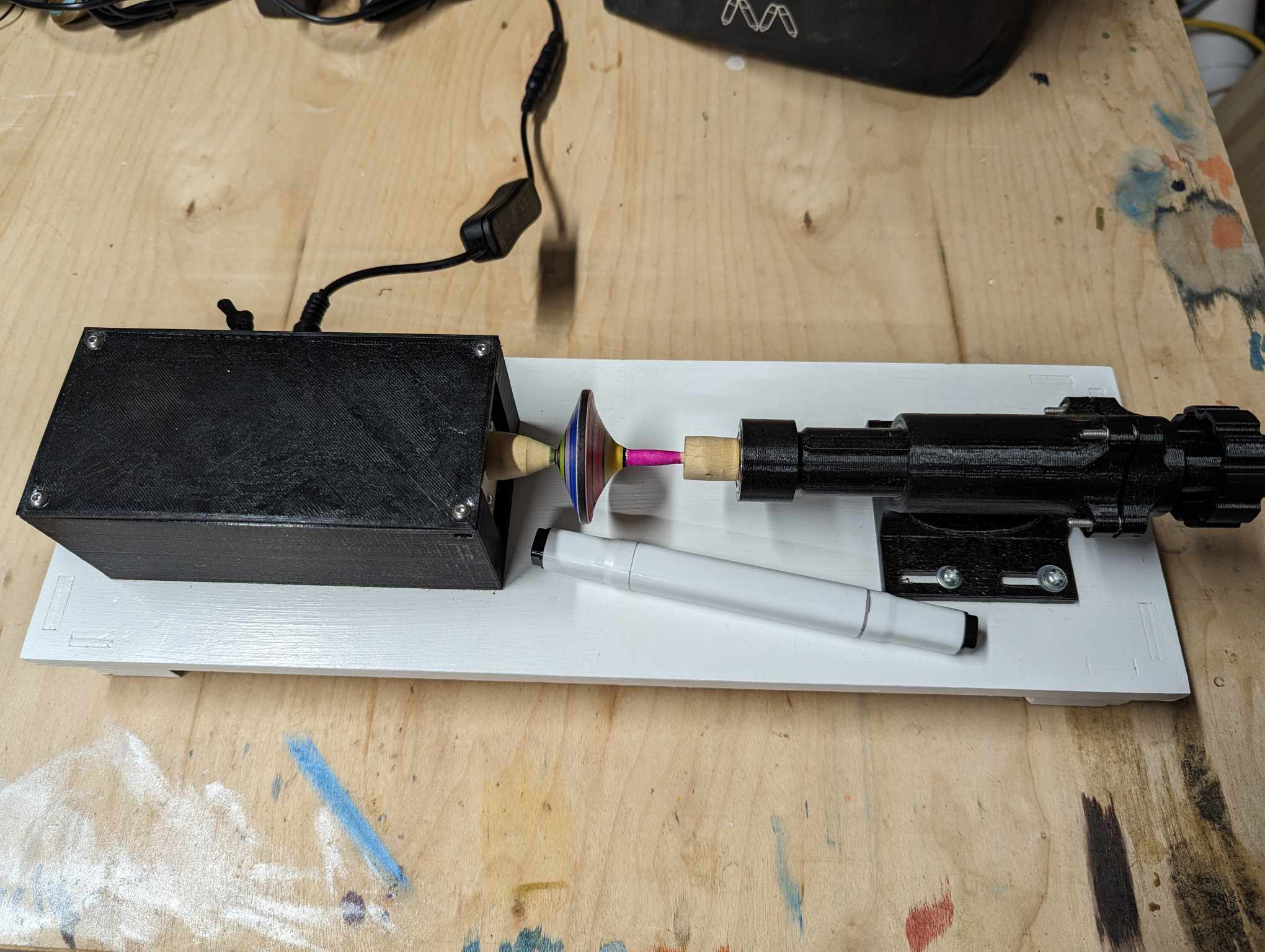 Micro lathe for coloring spinning tops