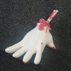 Micky's severed hand