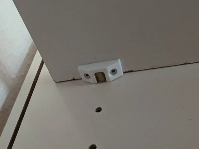 Shelf Board Dowel Retainer