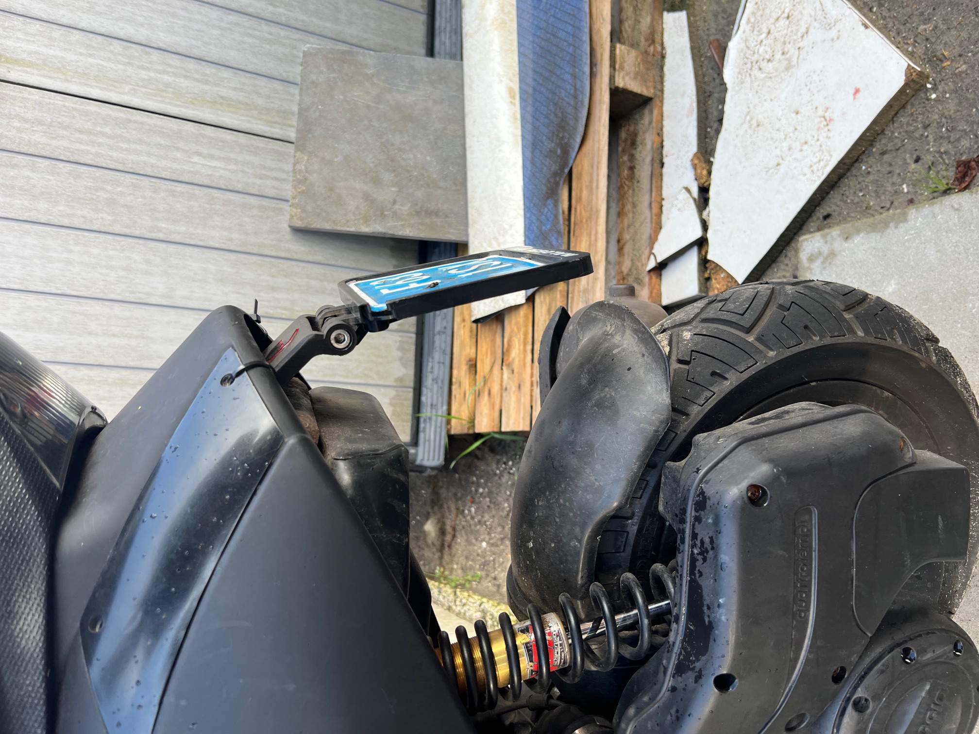 License plate bracket Piaggio zip to remove fender by Dynamite