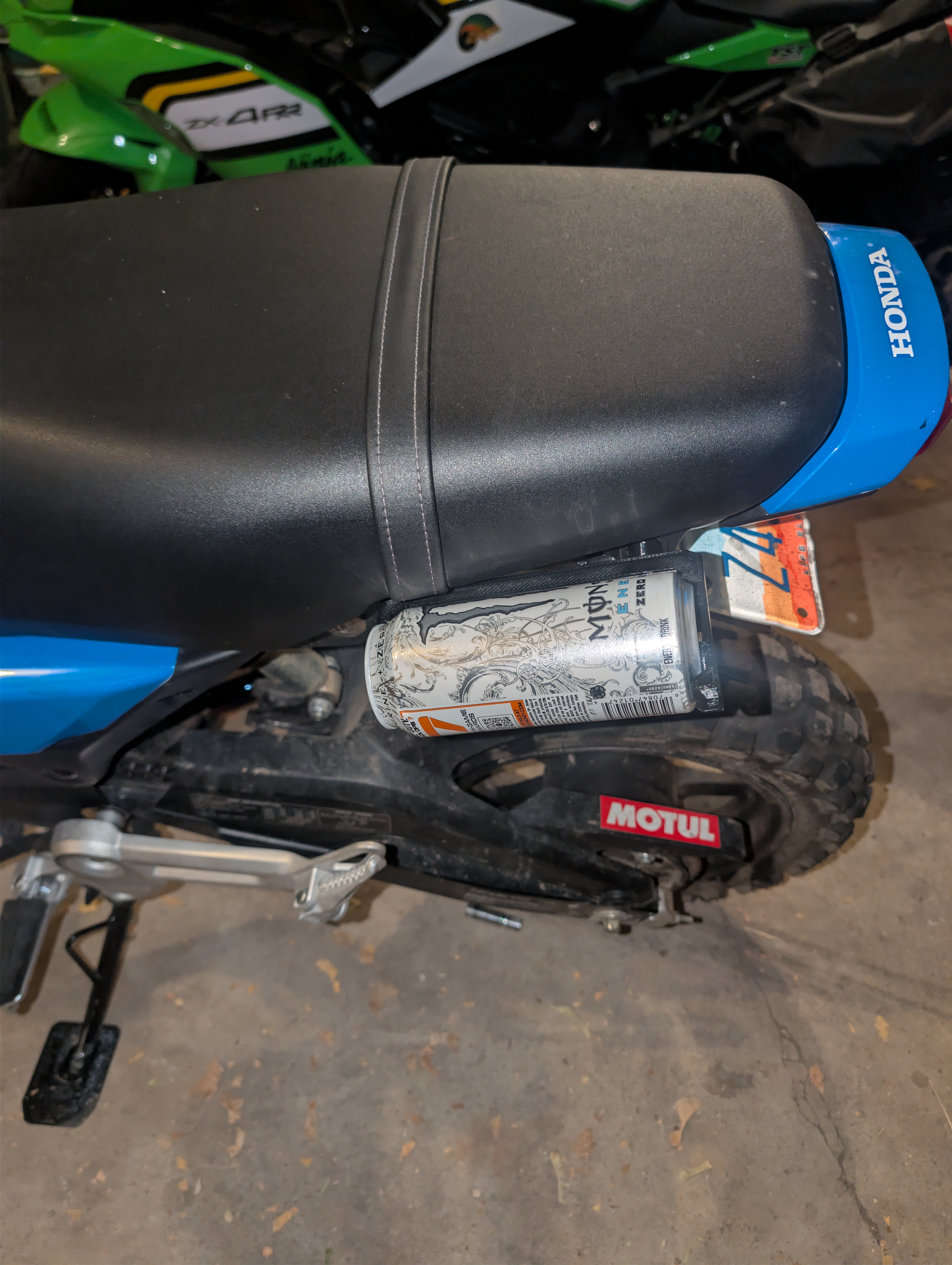 Can Clip fitted for 16oz cans (i.e. Monster Energy) for a Honda Grom