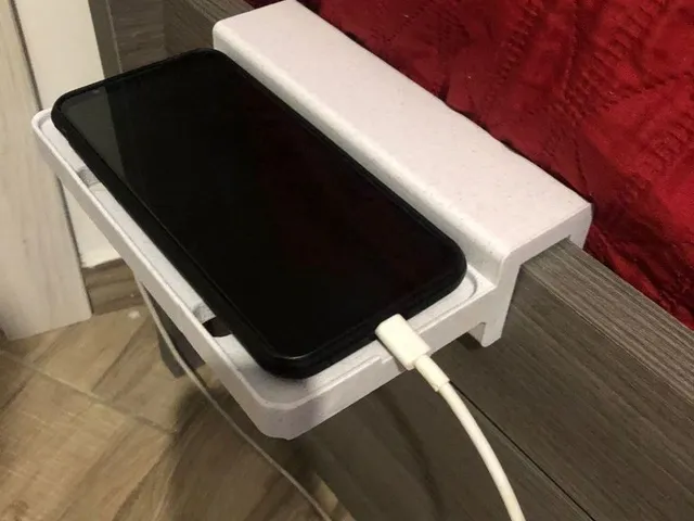 Universal bedside phone shelf