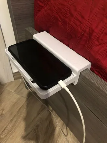 Universal bedside phone shelf