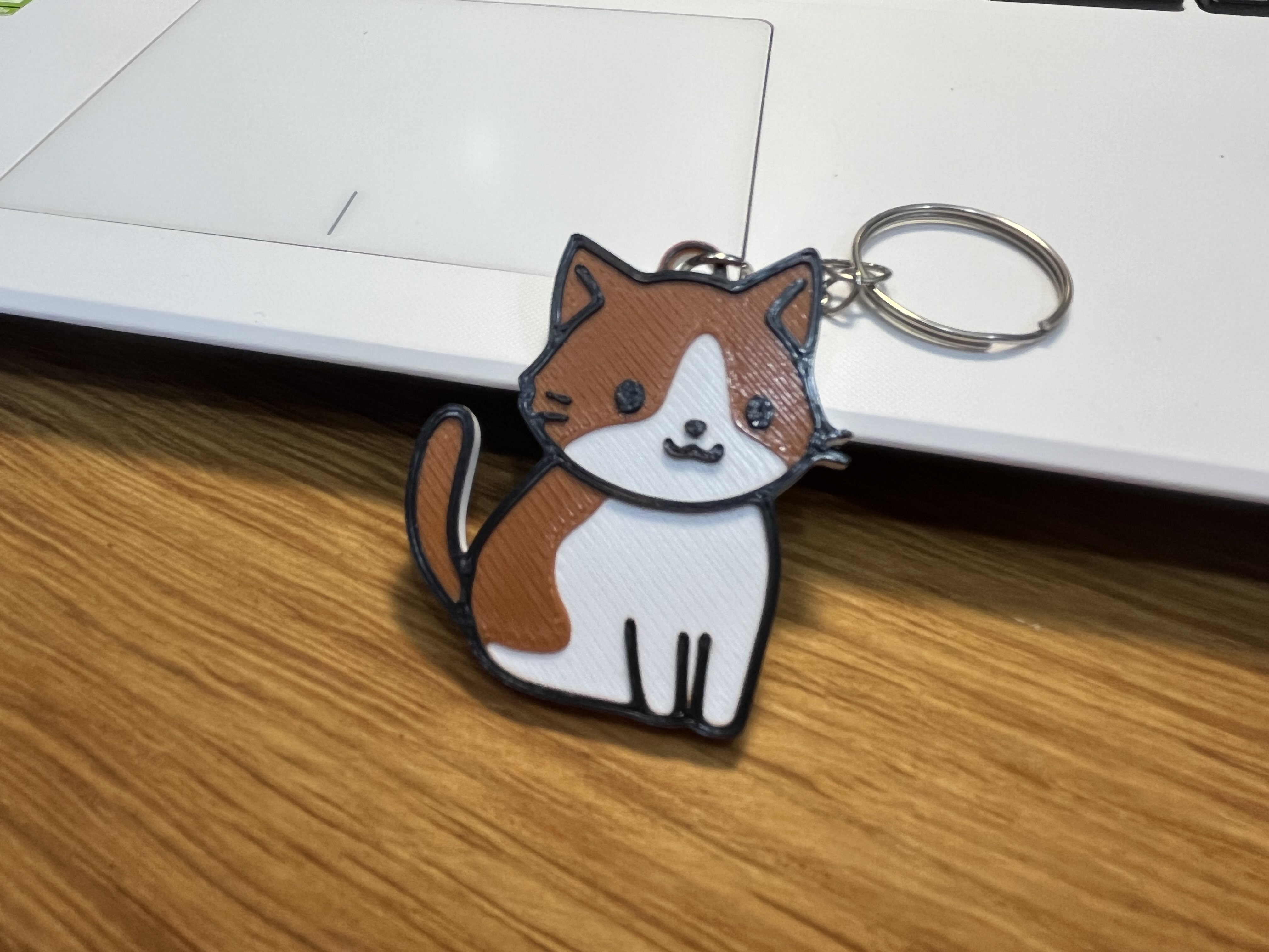 Miniatura 2 do modelo 3D Cute Brown Cat Keychain