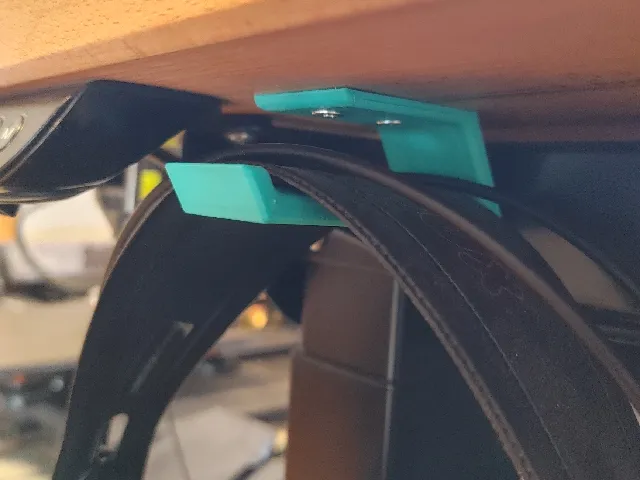 Low profile headphone hanger for under desk mounting