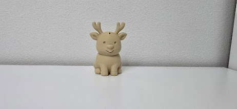 Cute Sitting Reindeer with Smiling Face Christmas Figurine