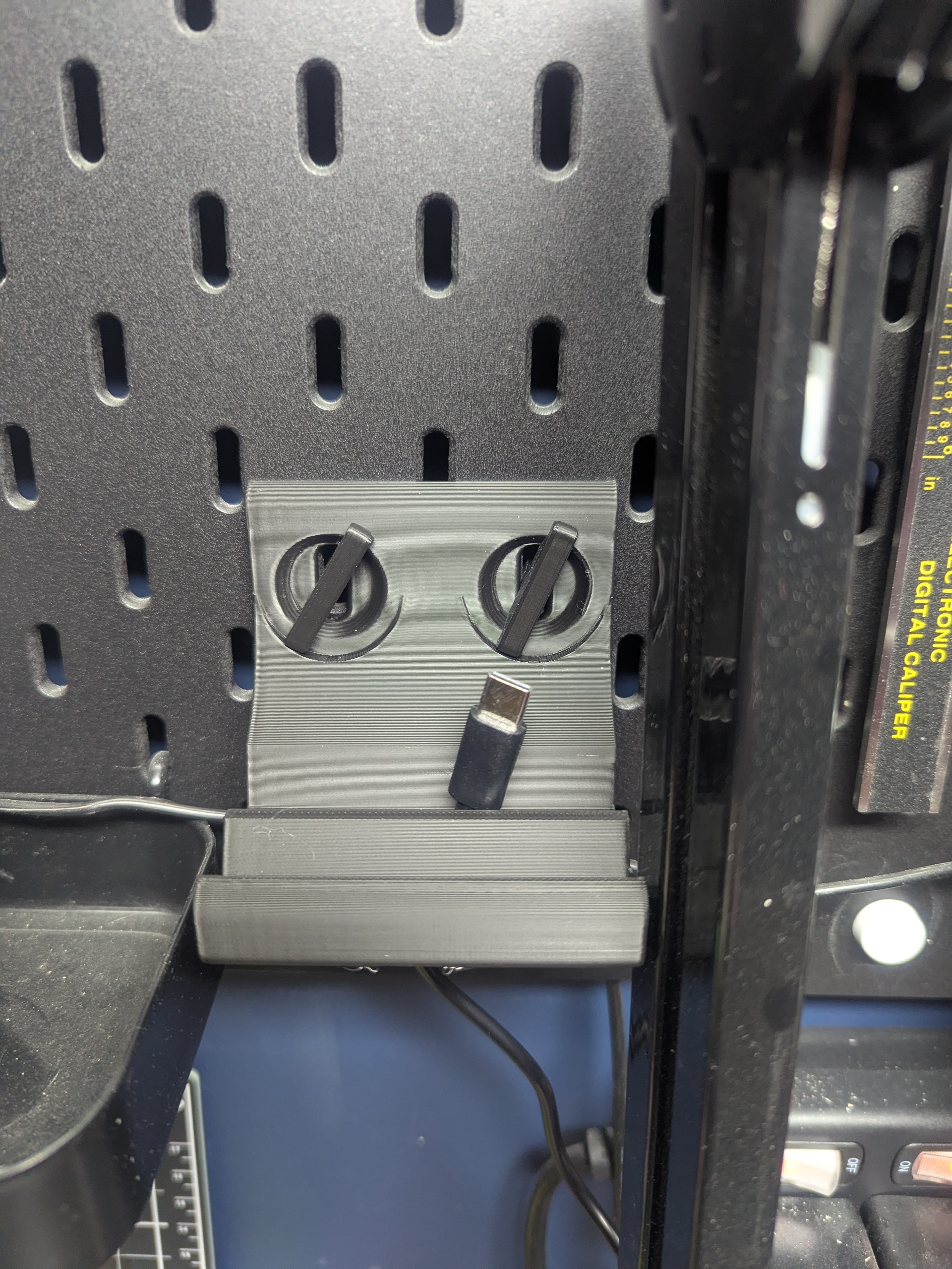 Skadis Phone Holder With Charging Cable Pass Throughs