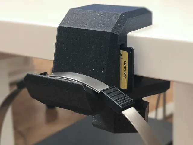 Headphone hook / SD card holder