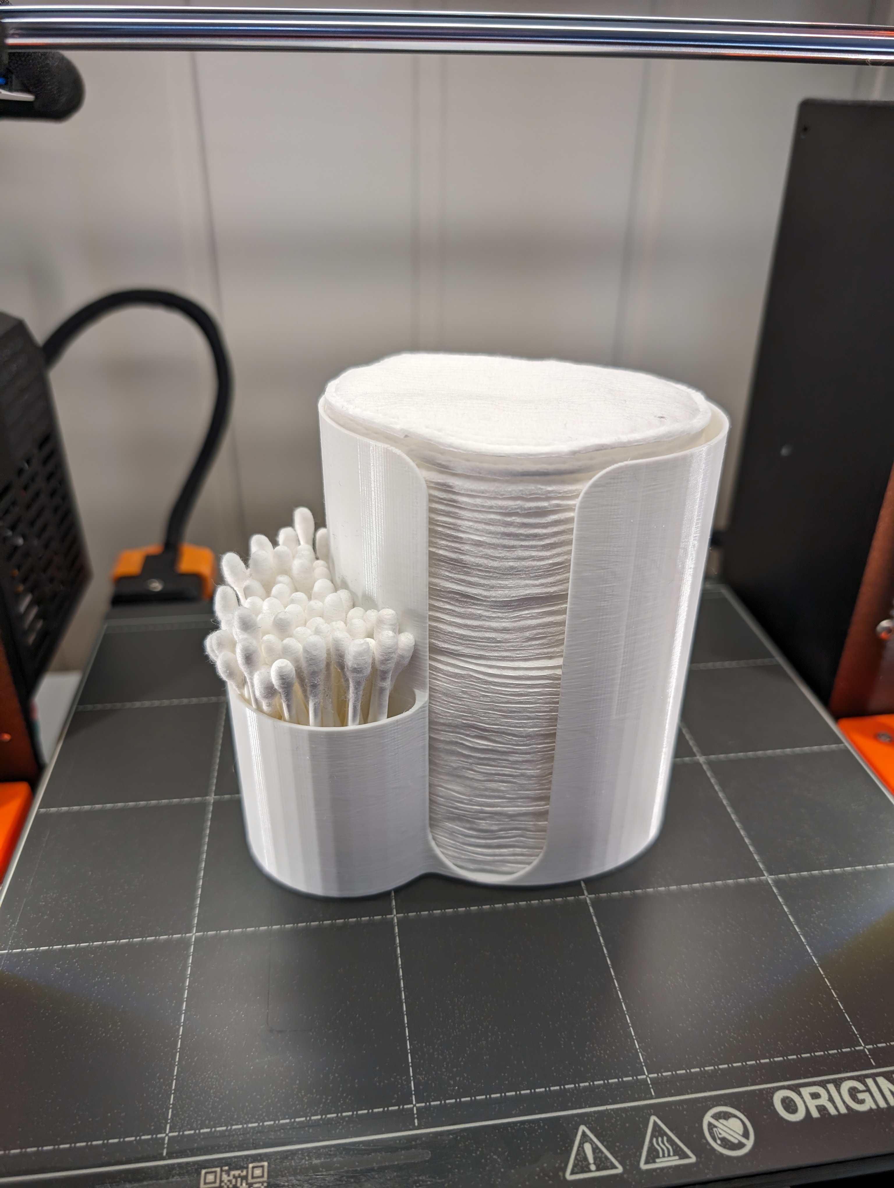 Cotton swabs and elliptical pads container