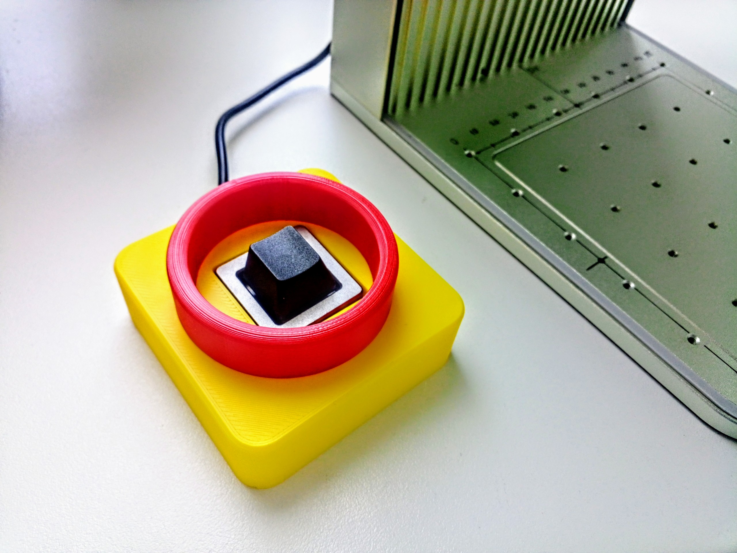 Holder for emergency pause/start xTool lasers button