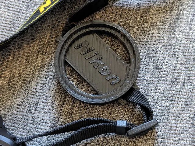 Nikon dual lens cap holder 55mm/62mm