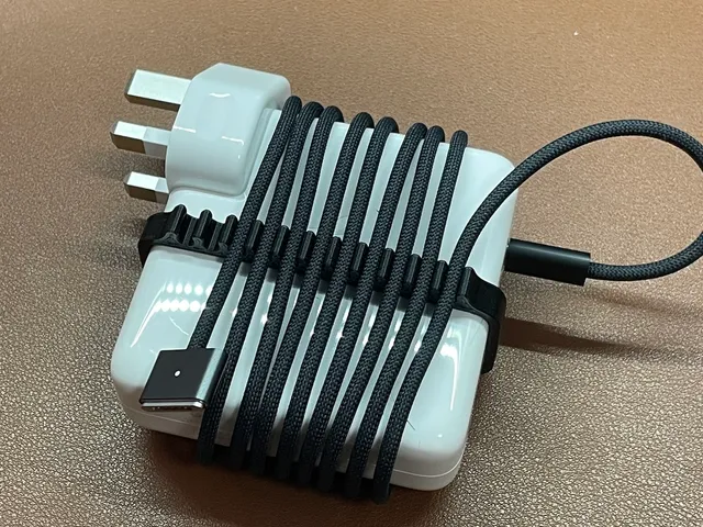Apple 96W USB-C Power adapter Cable holder.