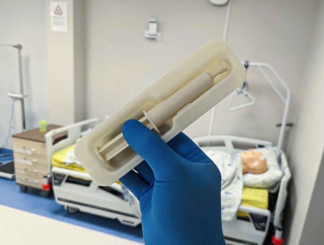 Lubricating gel syringe prop for healthcare simulation
