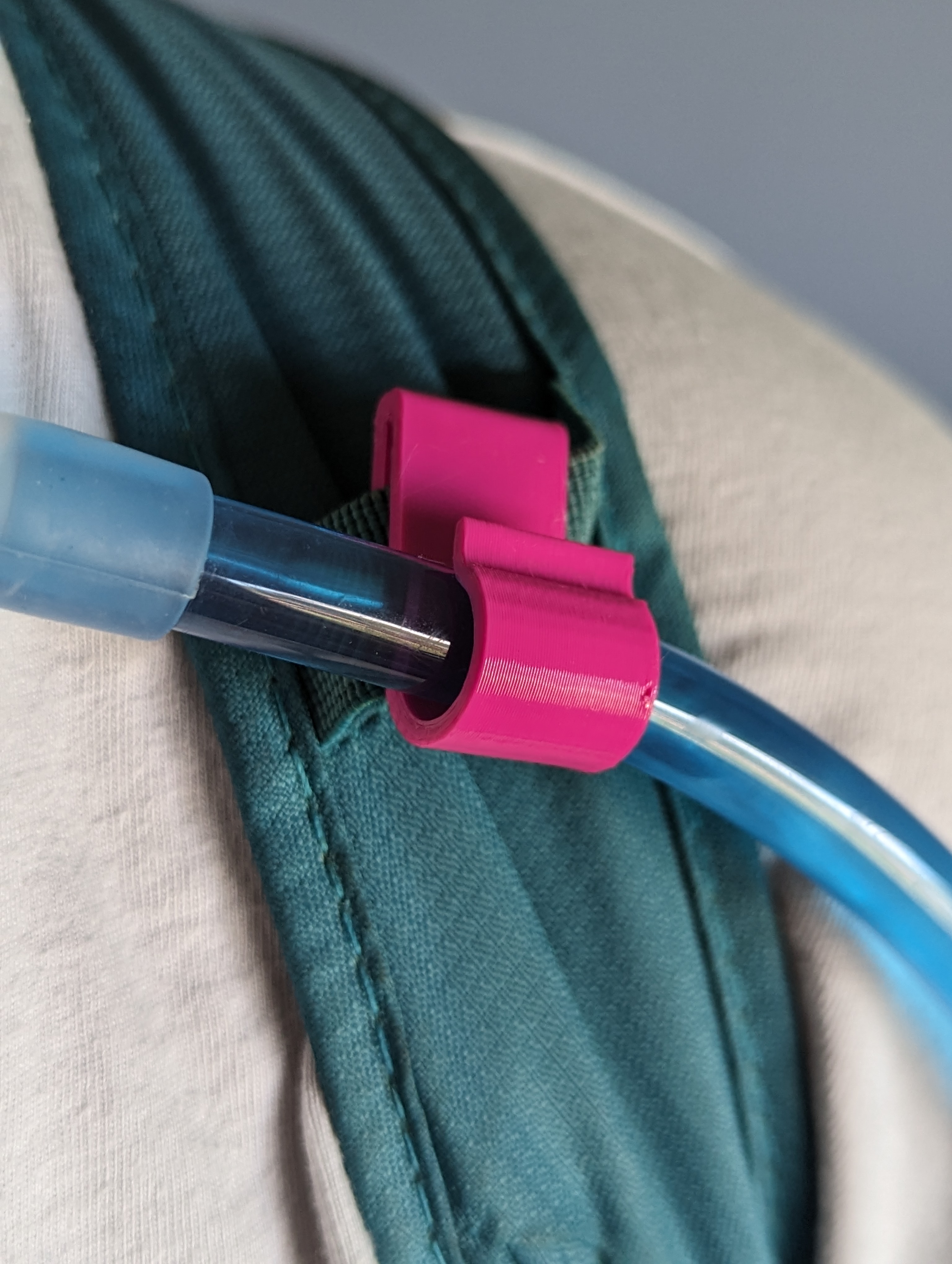 hydration hose/webbing clip