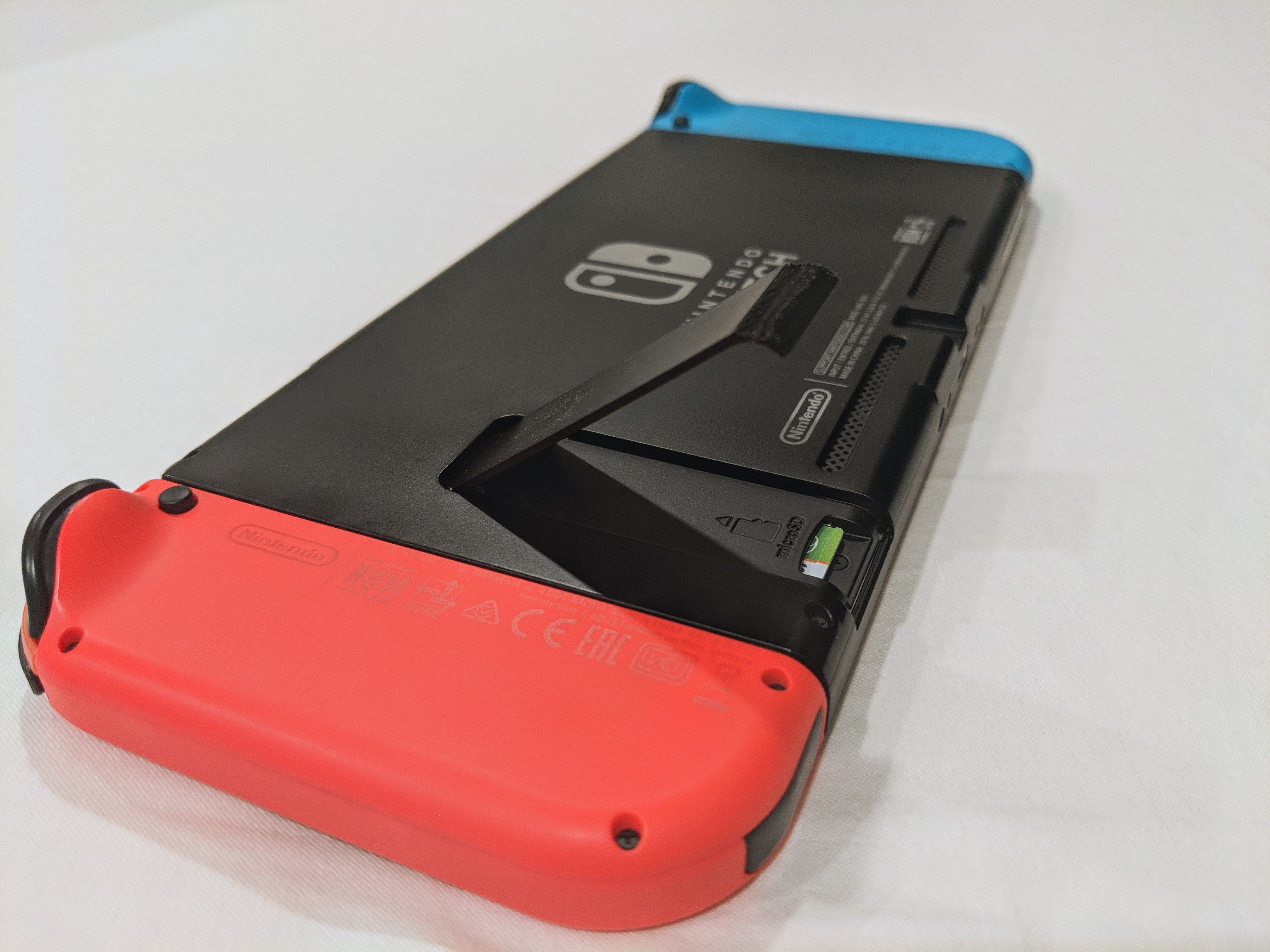 Nintendo switch kickstand microsd cover improved by shibafactory