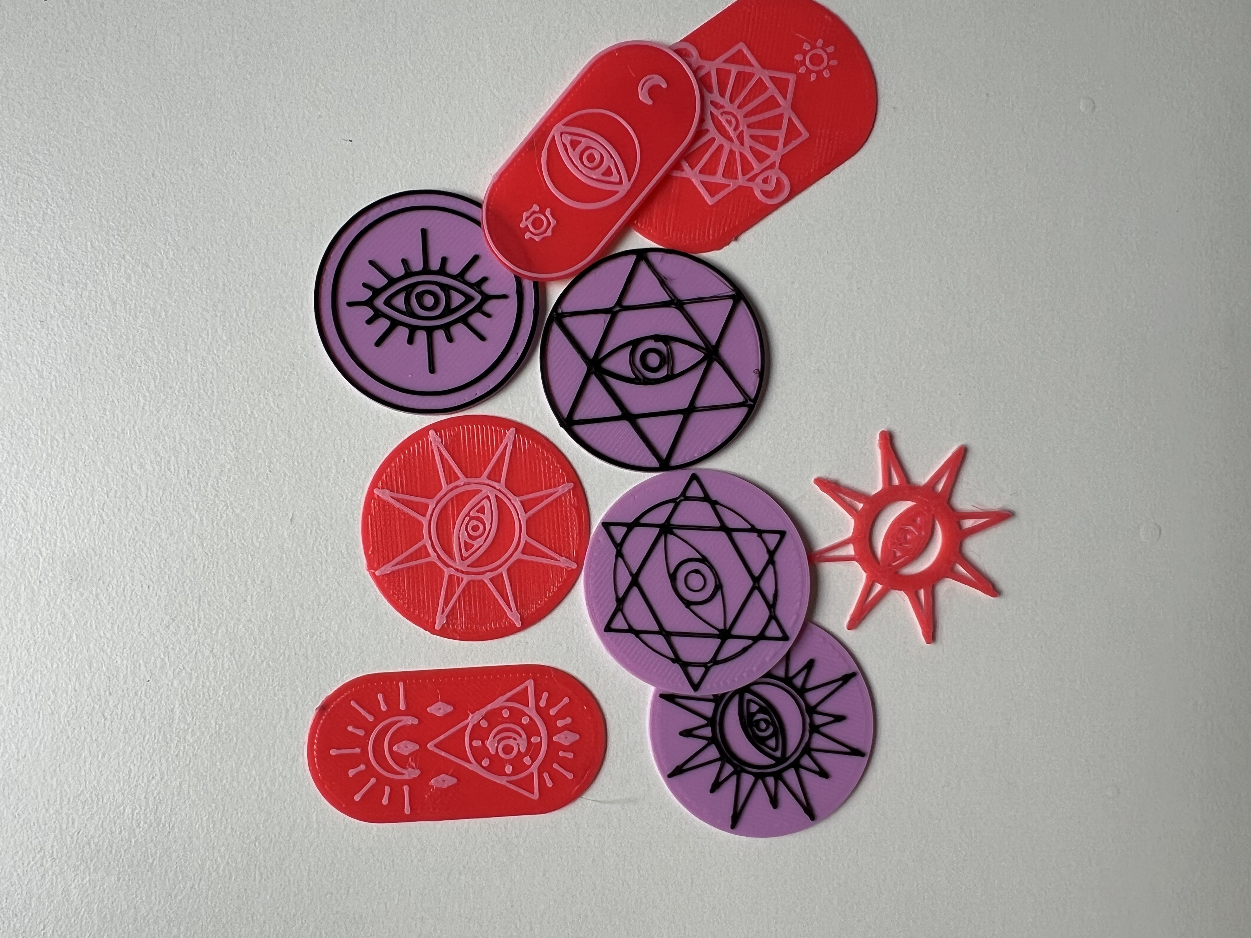 Pendants and insignias with magic symbols