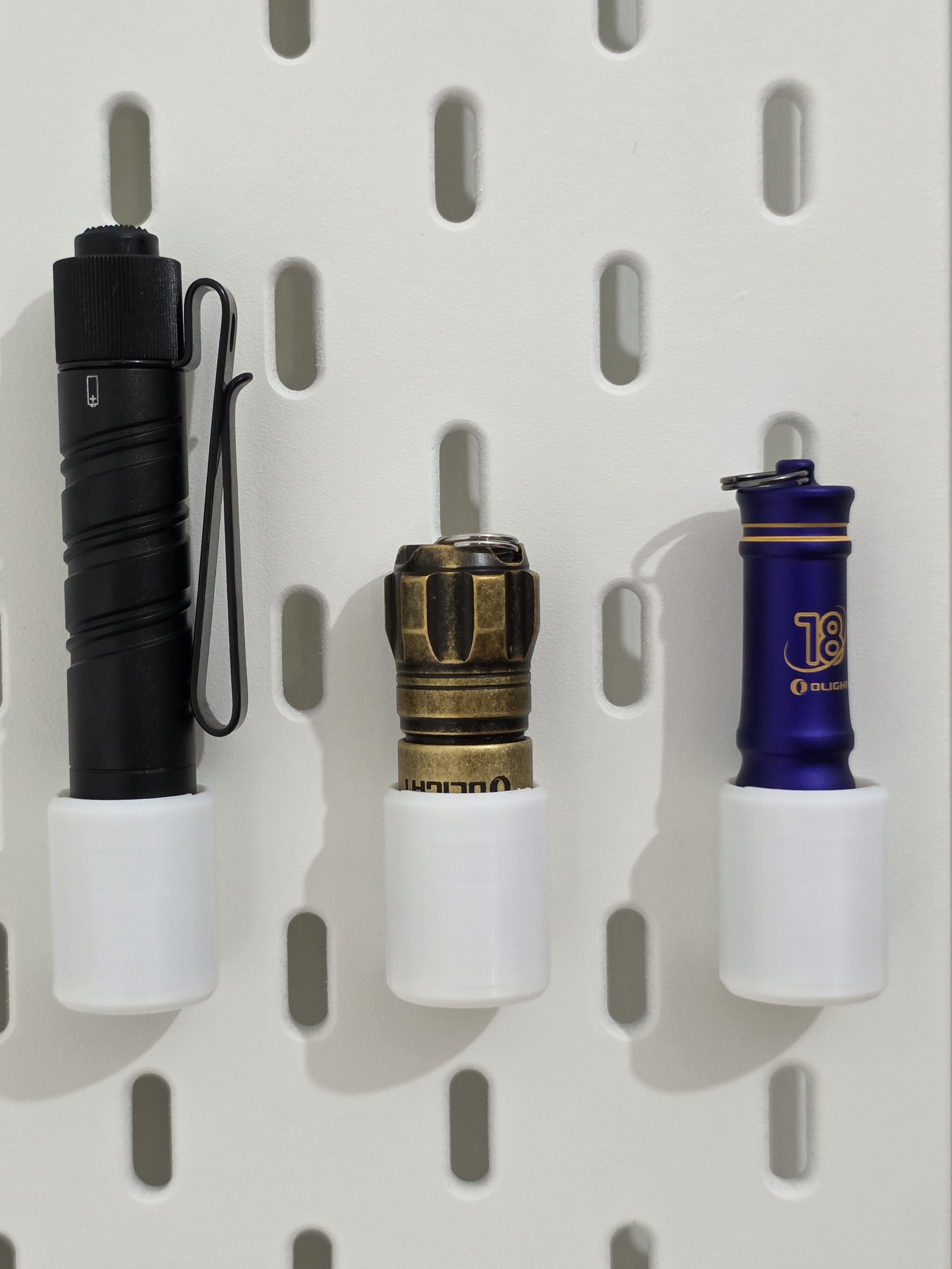 Olight i3t/i3e/i18 flashlight holder for IKEA Skadis pegboard