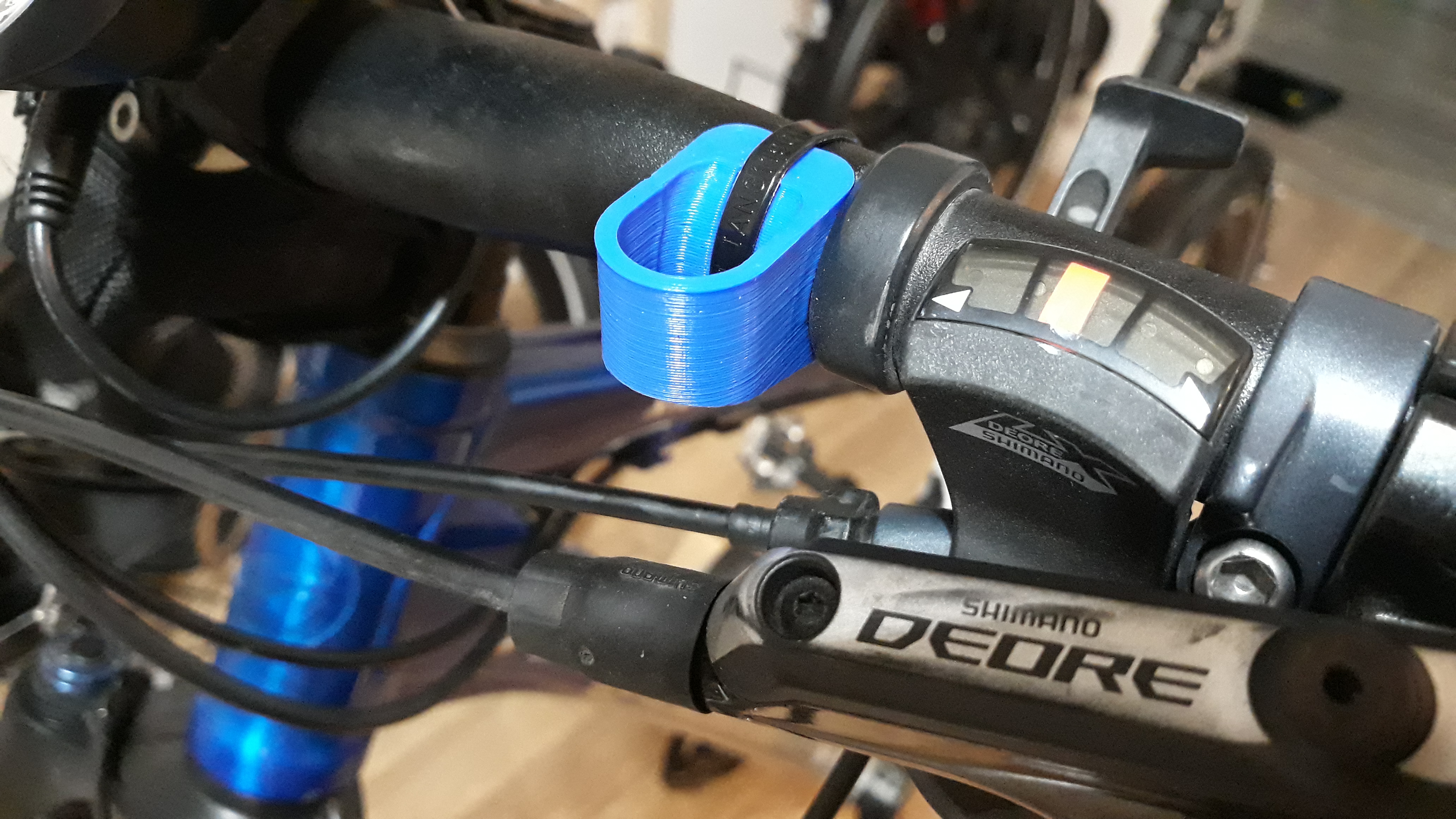 Glasses hanger for handlebar