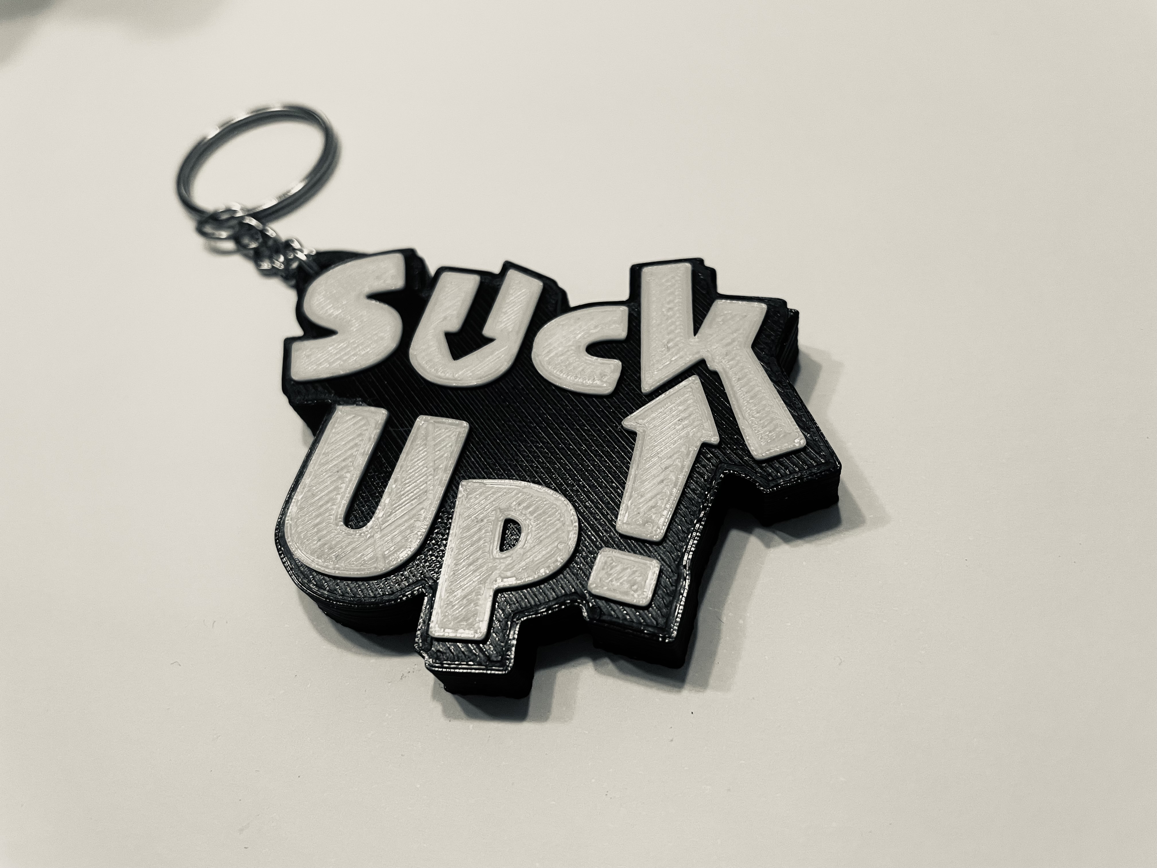 Suck Up! Videogame Keychain